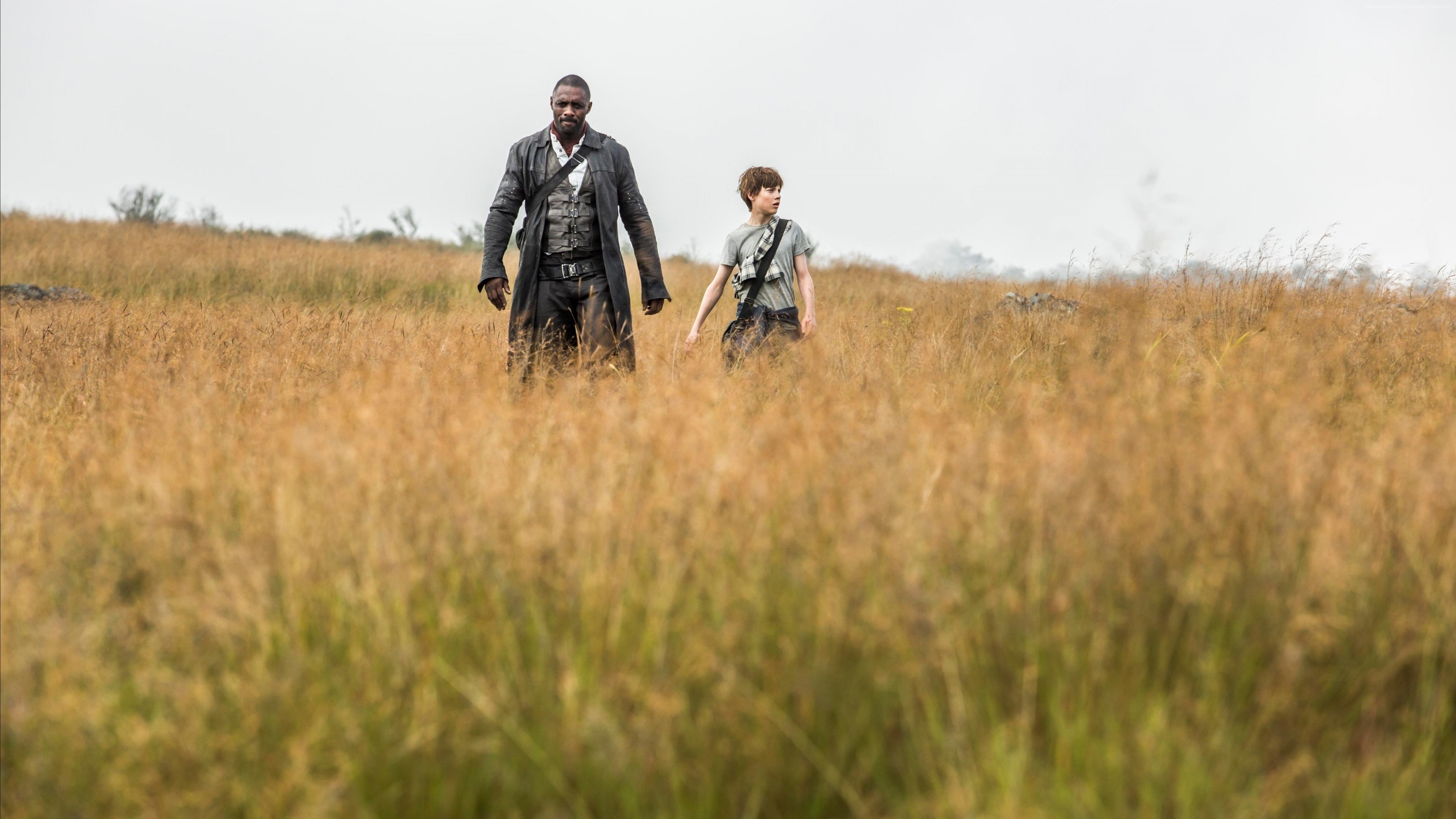 Roland and Jake from The Dark Tower walking through a field HD Wallpaper