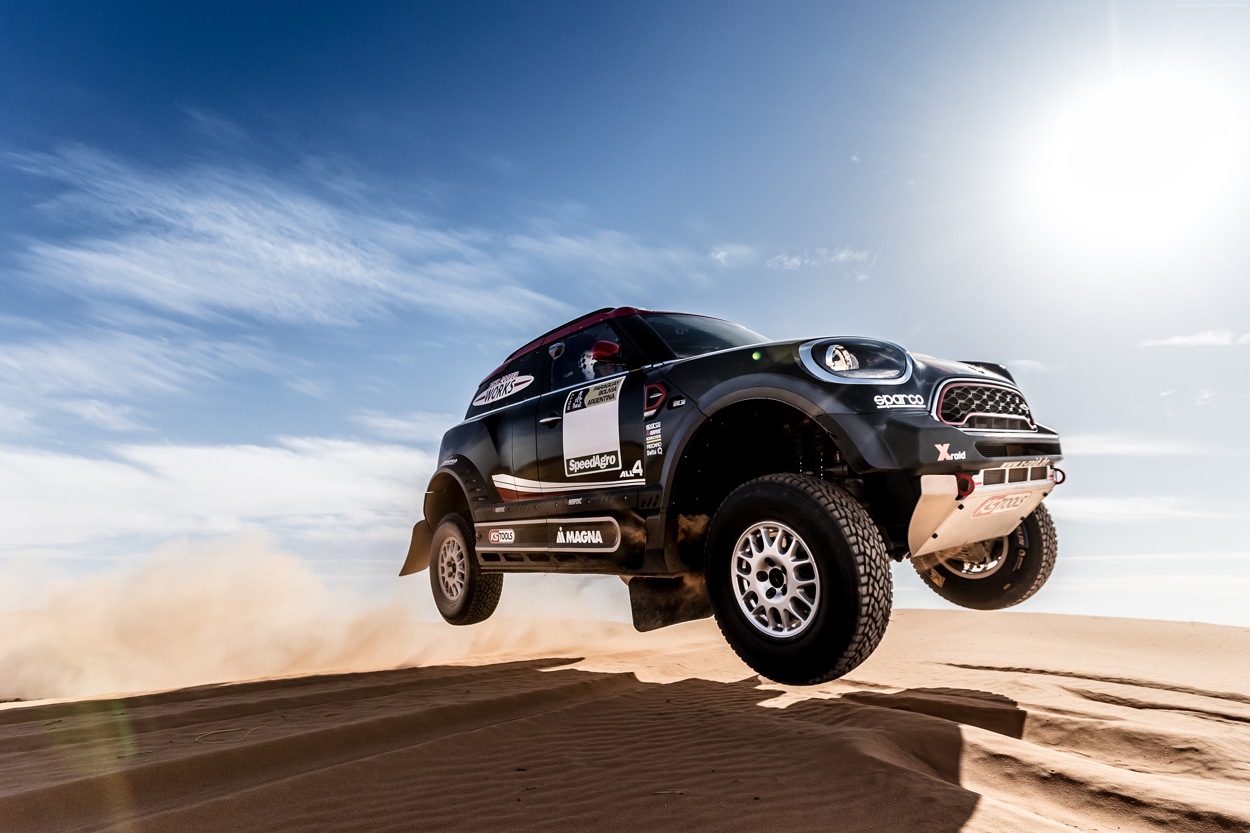 Mini Rally Car Jumps Over Sand Dune HD Wallpaper
