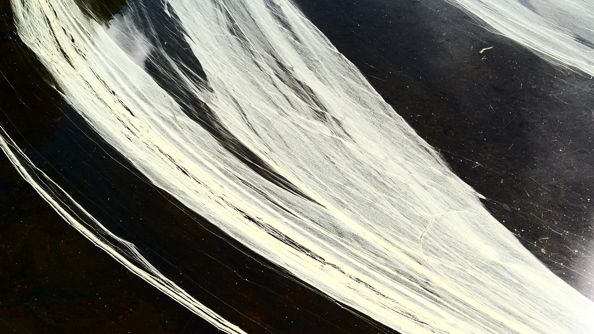 Abstract pattern of white lines on black surface HD Wallpaper