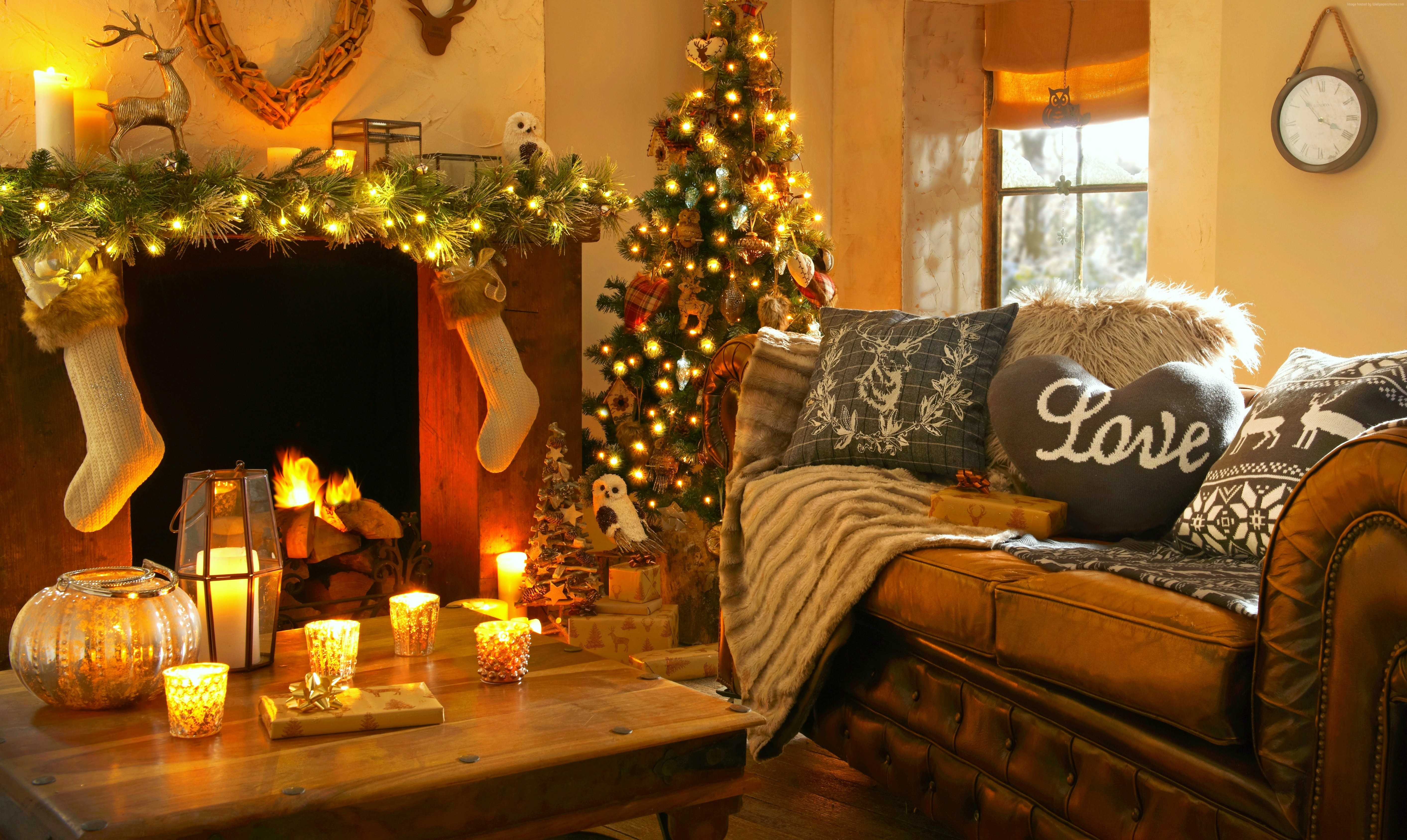 Cozy Christmas living room with fireplace and tree HD Wallpaper