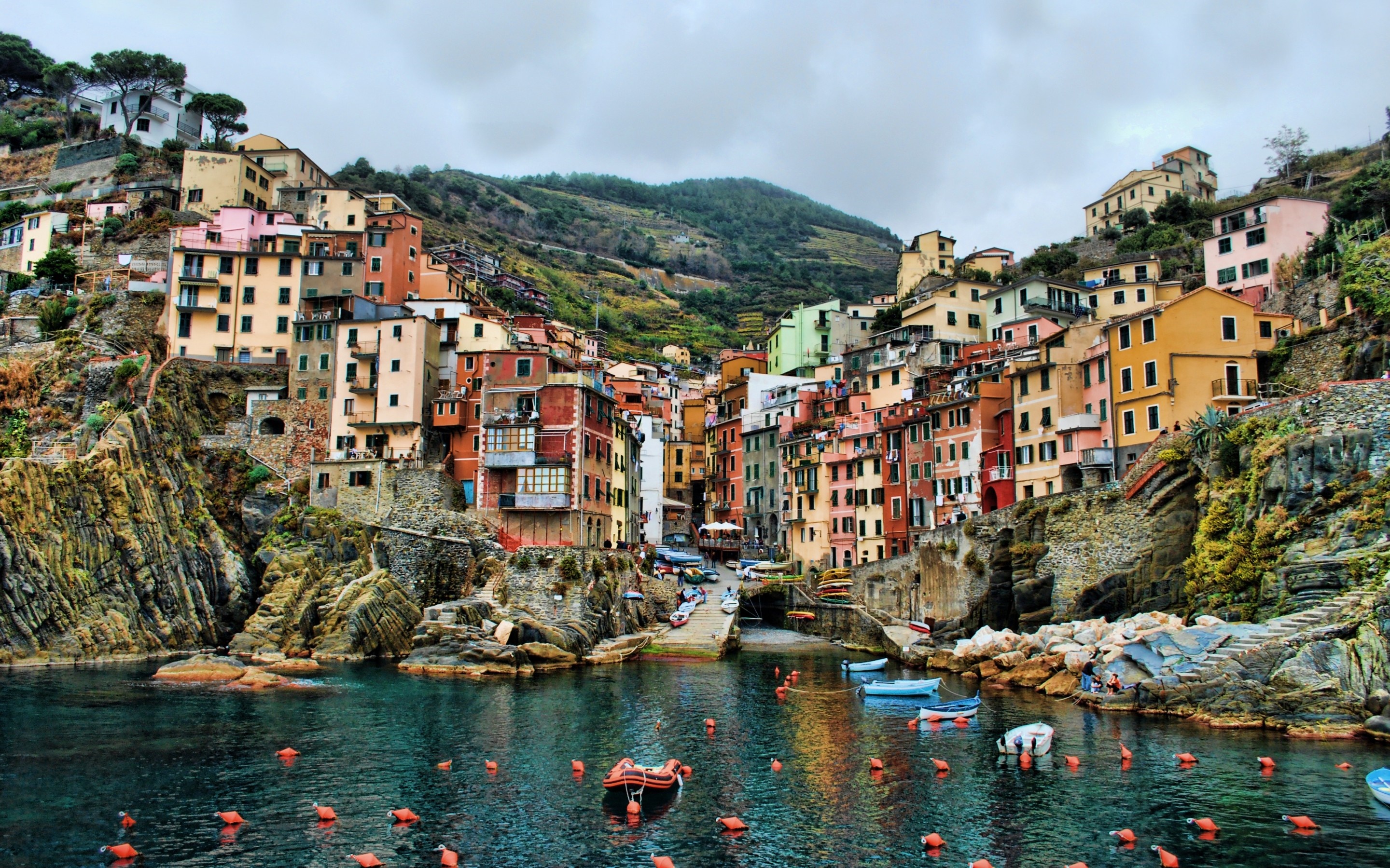 Colorful Italian village on a rocky coast overlooking the sea HD Wallpaper