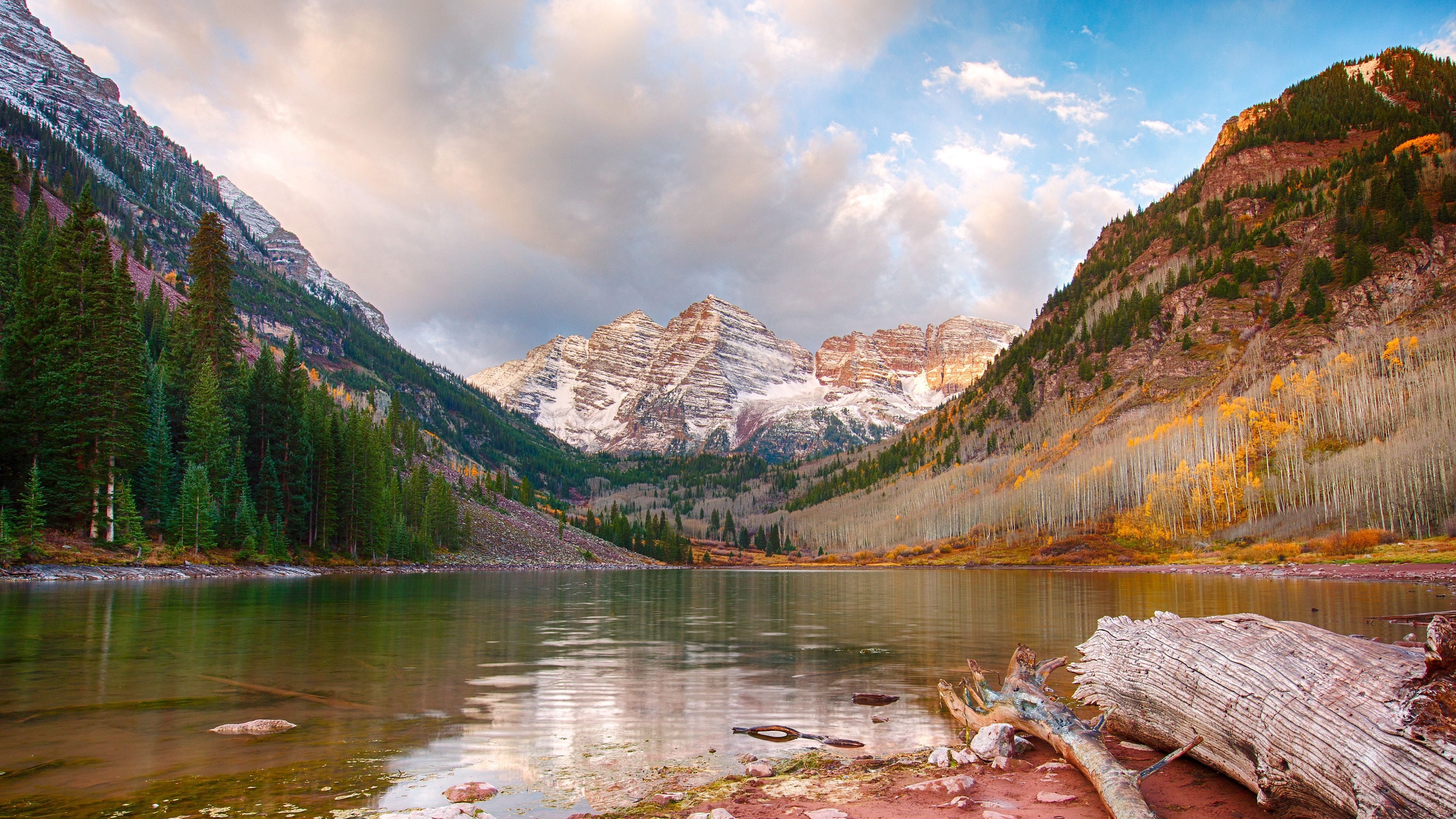 Maroon Bells mountains reflected in lake during autumn HD Wallpaper