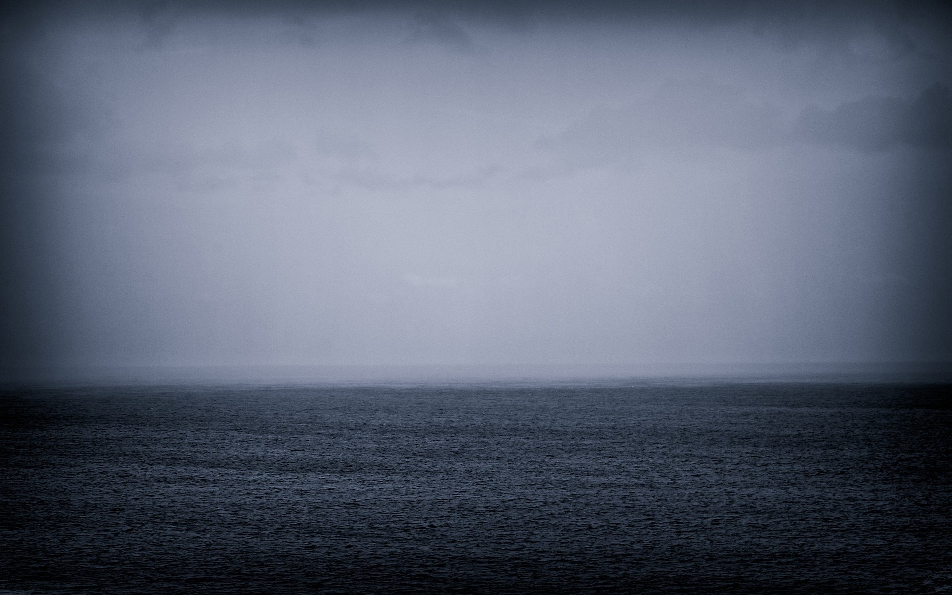 Monochrome sea and sky with mist on the horizon HD Wallpaper
