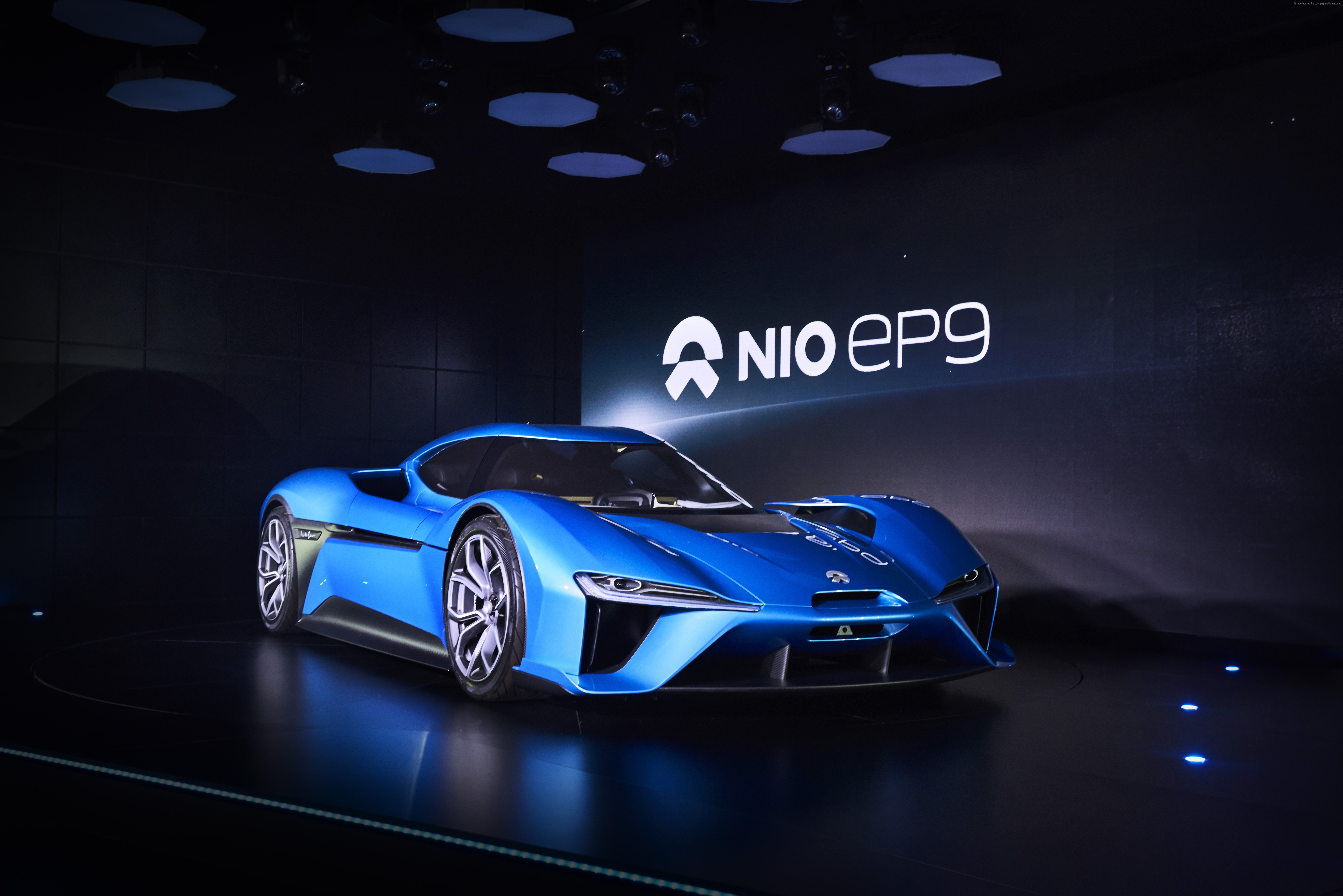Blue NIO EP9 electric sports car on display HD Wallpaper