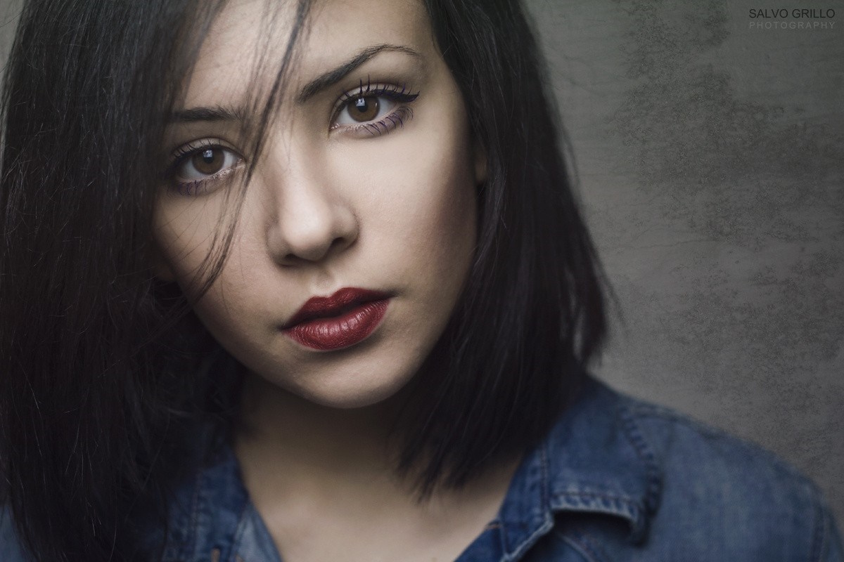 Portrait of a young woman with dark hair and red lipstick HD Wallpaper