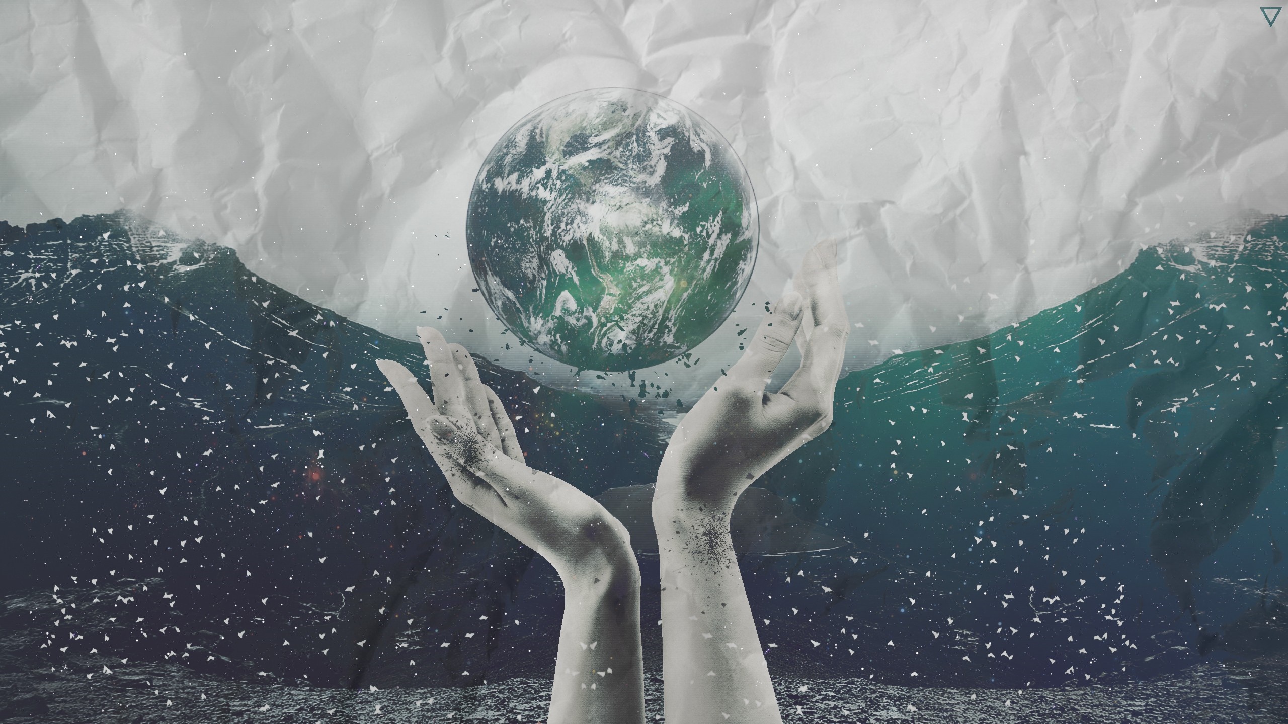 Hands holding the Earth above waves and crumpled paper HD Wallpaper