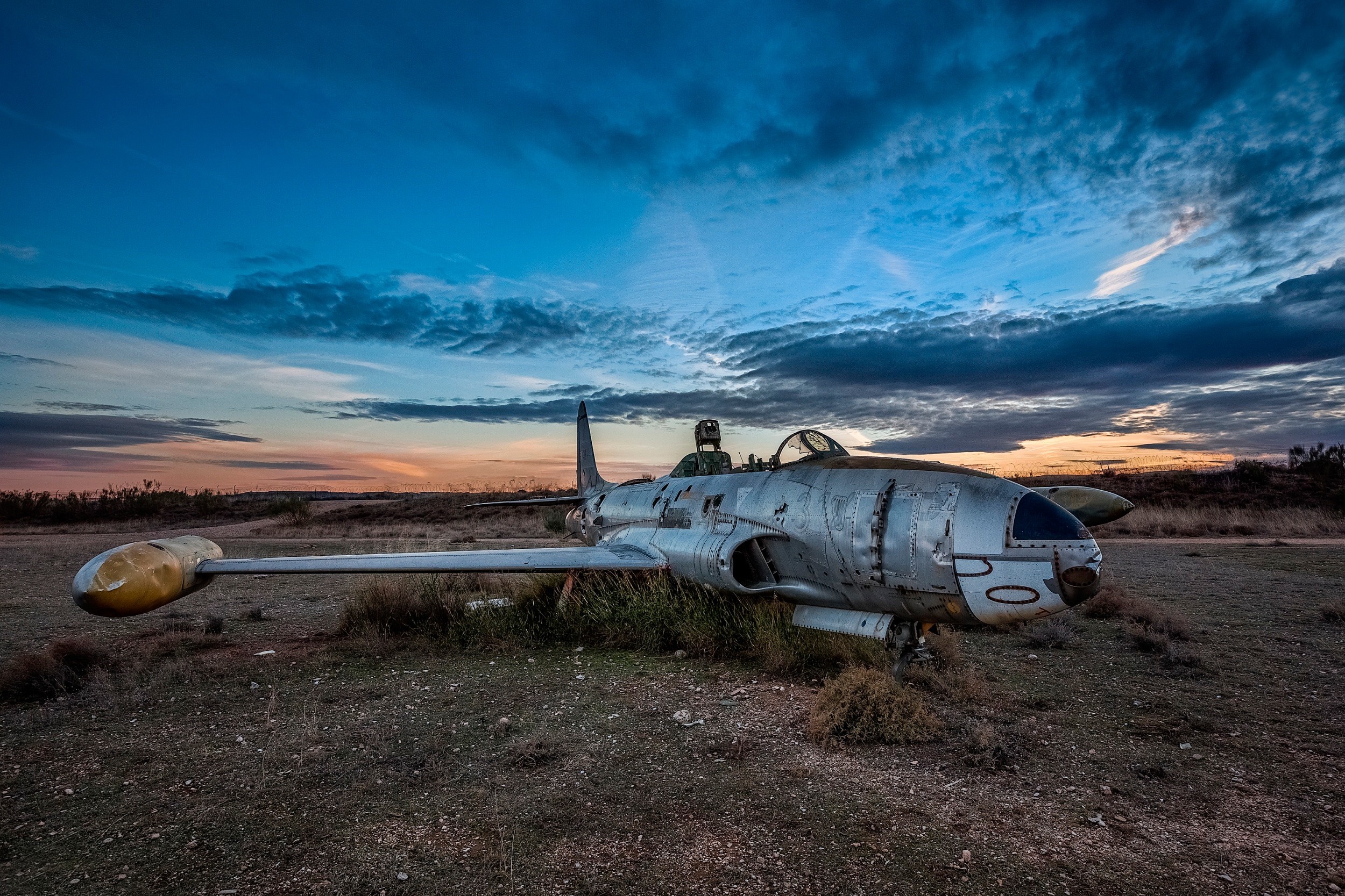 Abandoned T-33 Jet Aircraft at Dusk HD Wallpaper