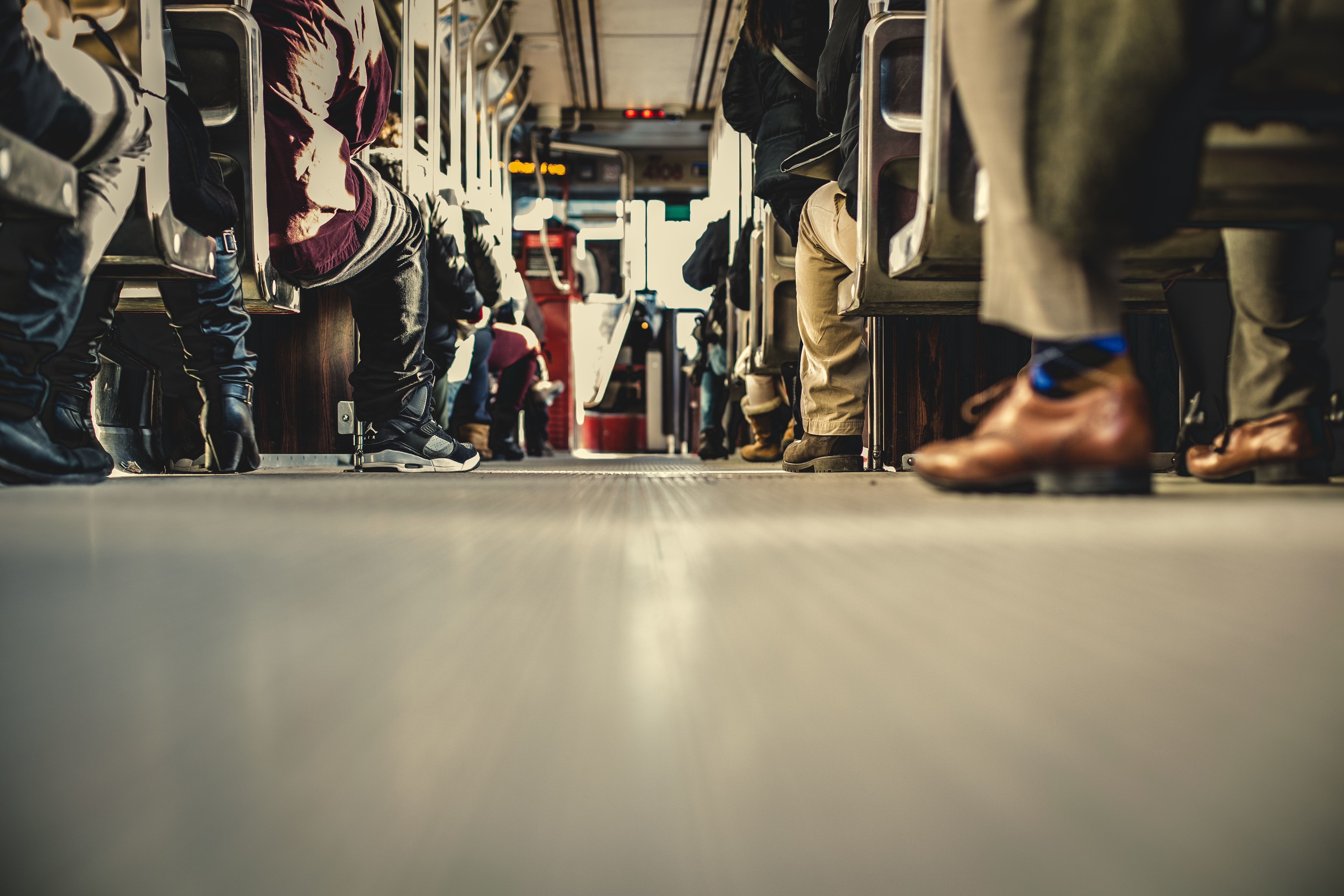 People on a tram, low angle shot HD Wallpaper