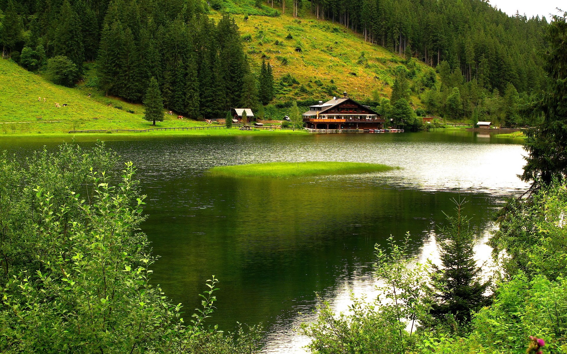 Lake and mountain landscape with a building HD Wallpaper