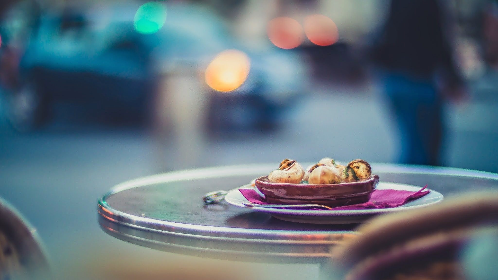 Escargots on a table with bokeh background HD Wallpaper
