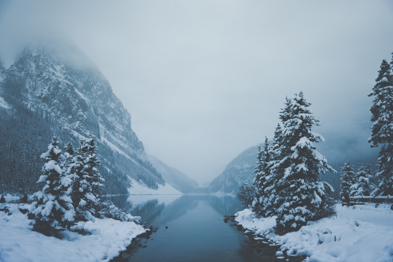 Snow-covered mountains and lake in winter HD Wallpaper