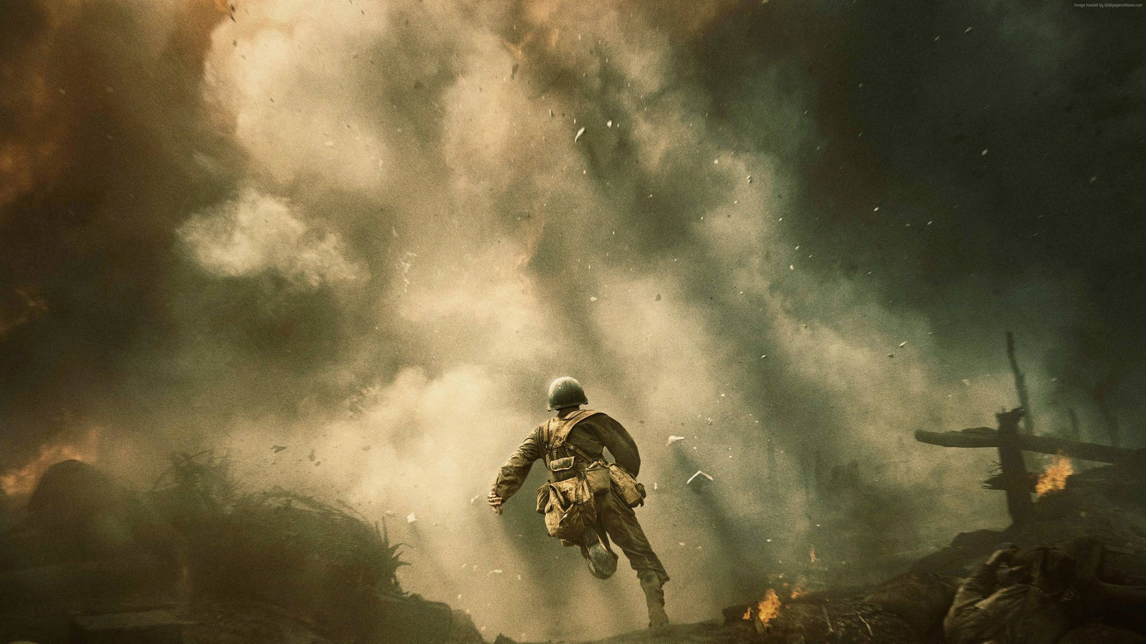 Soldier running through smoke and debris HD Wallpaper
