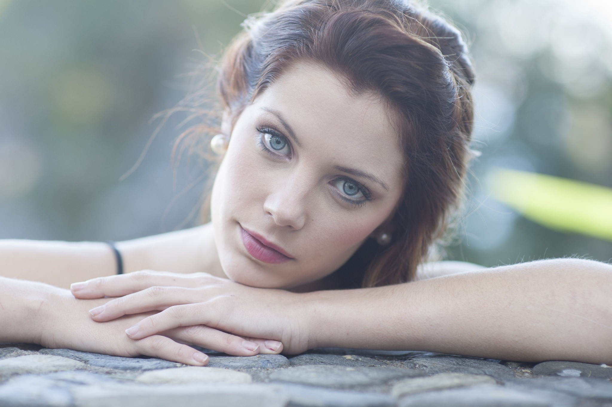 Woman with blue eyes and brown hair posing HD Wallpaper
