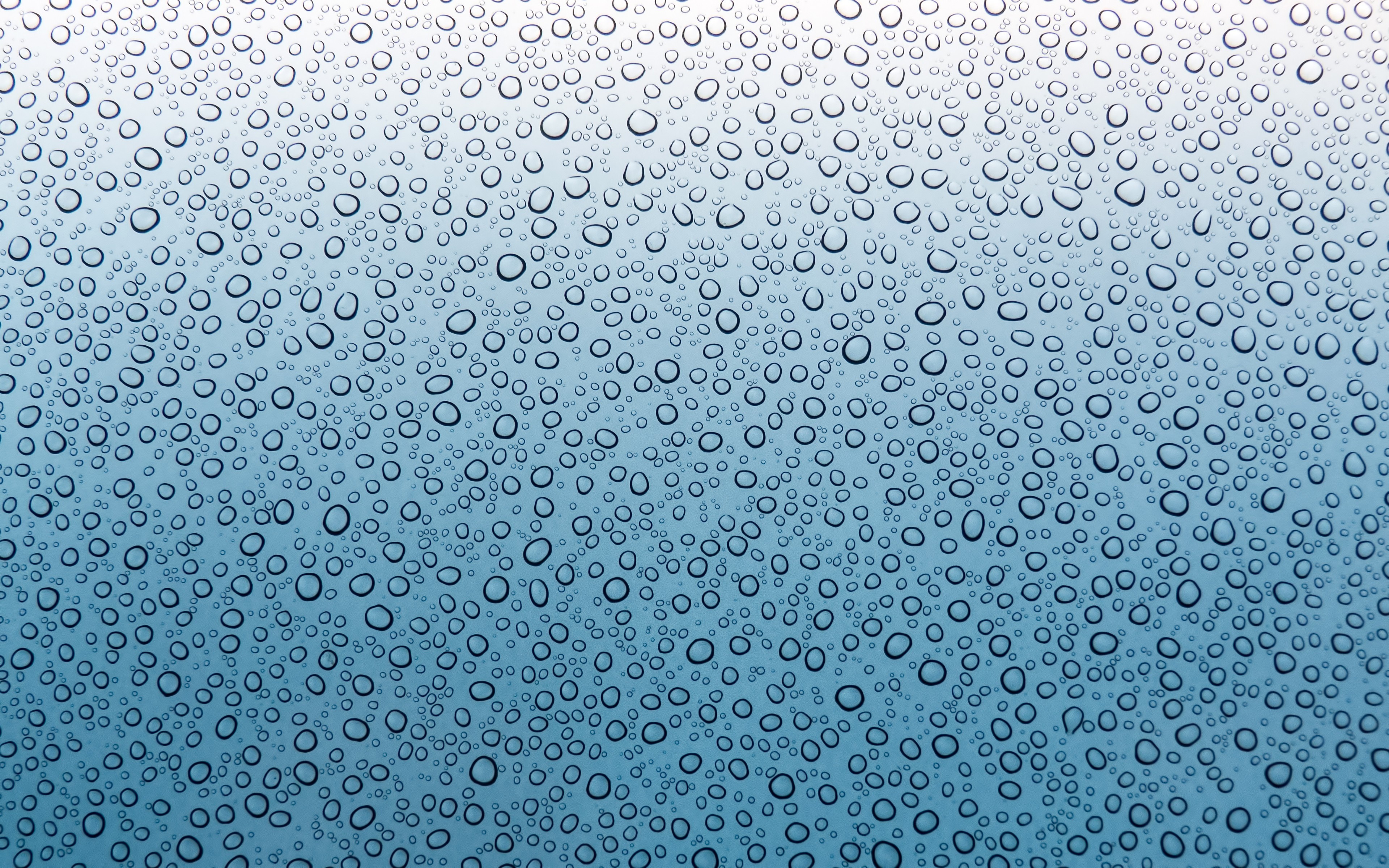 Water drops on a blue surface HD Wallpaper