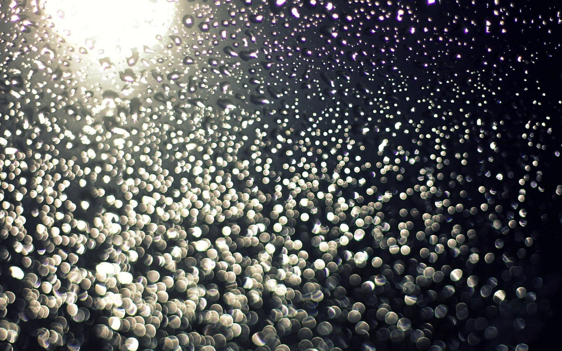 Water drops on glass with bokeh effect HD Wallpaper