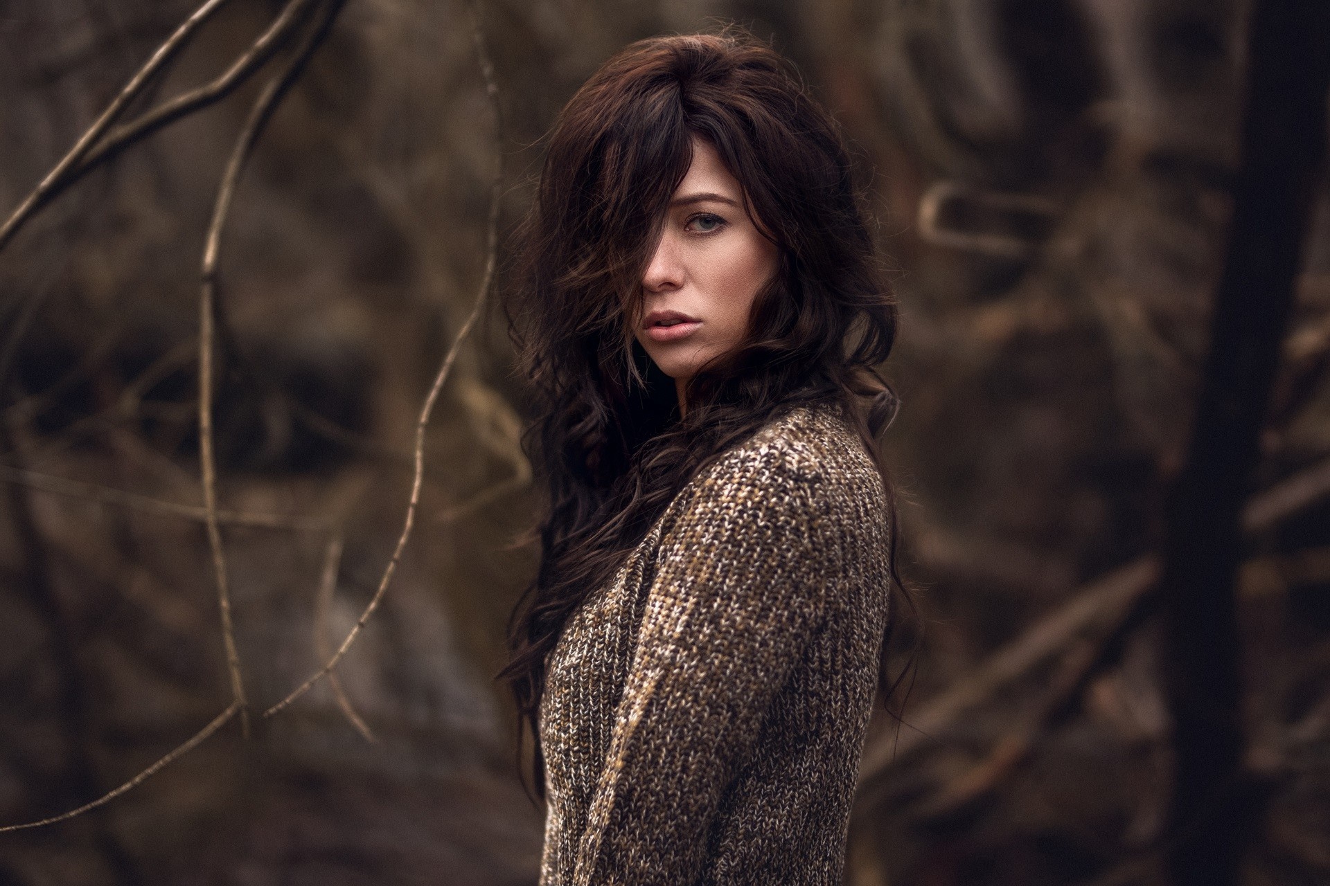 Woman with long brown hair wearing a sweater outdoors HD Wallpaper
