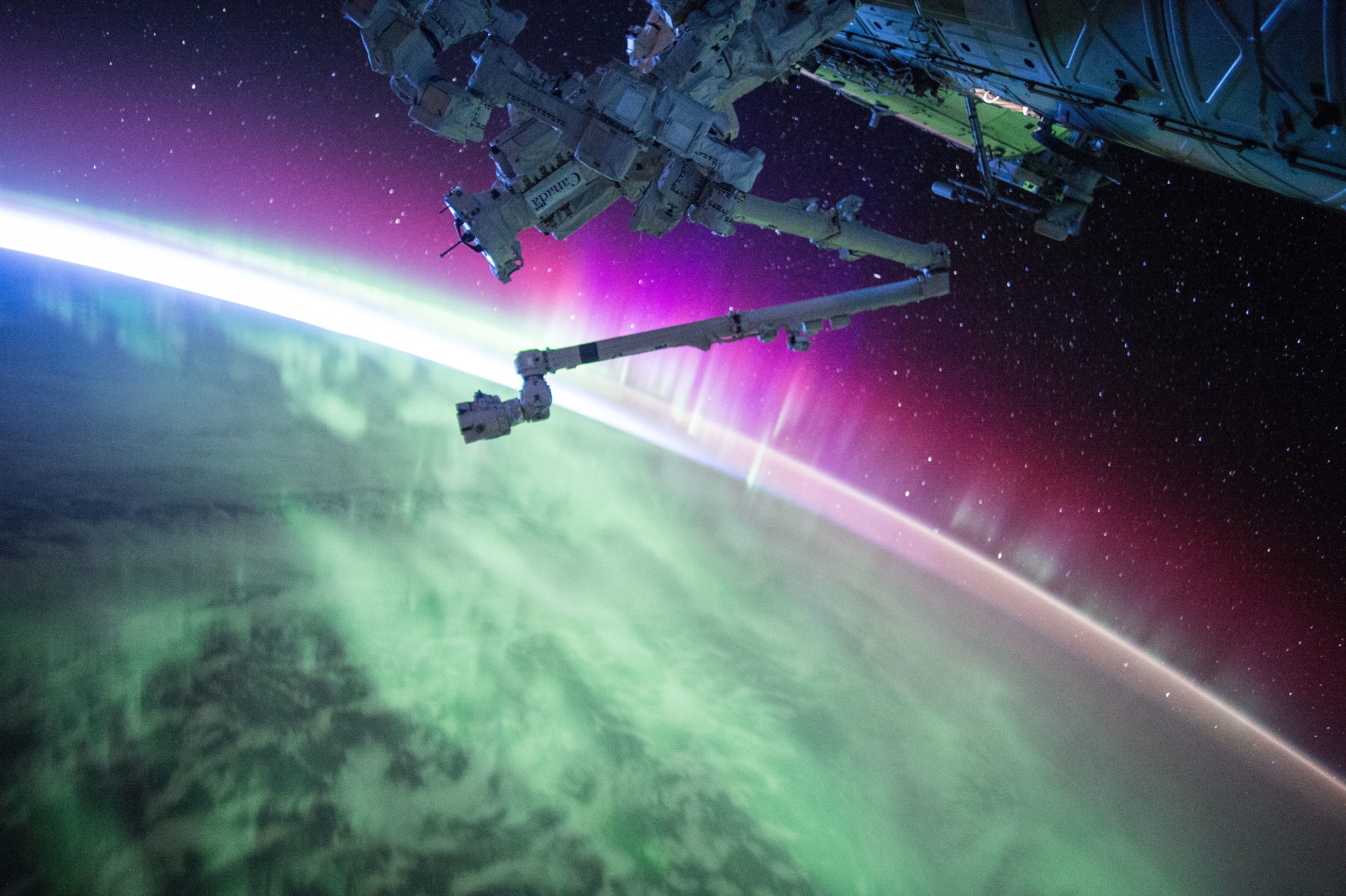 International Space Station arm over Earth aurora HD Wallpaper