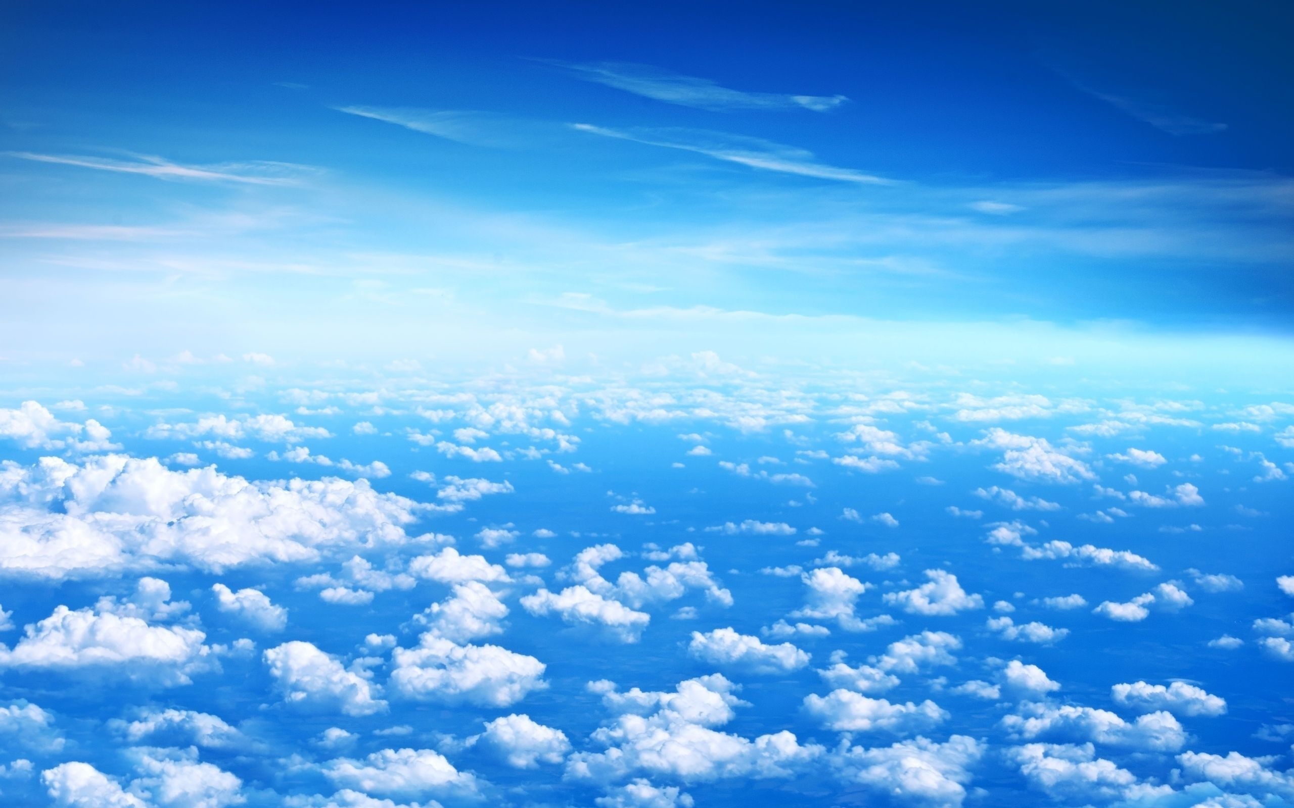 Blue sky with cumulus clouds from above HD Wallpaper