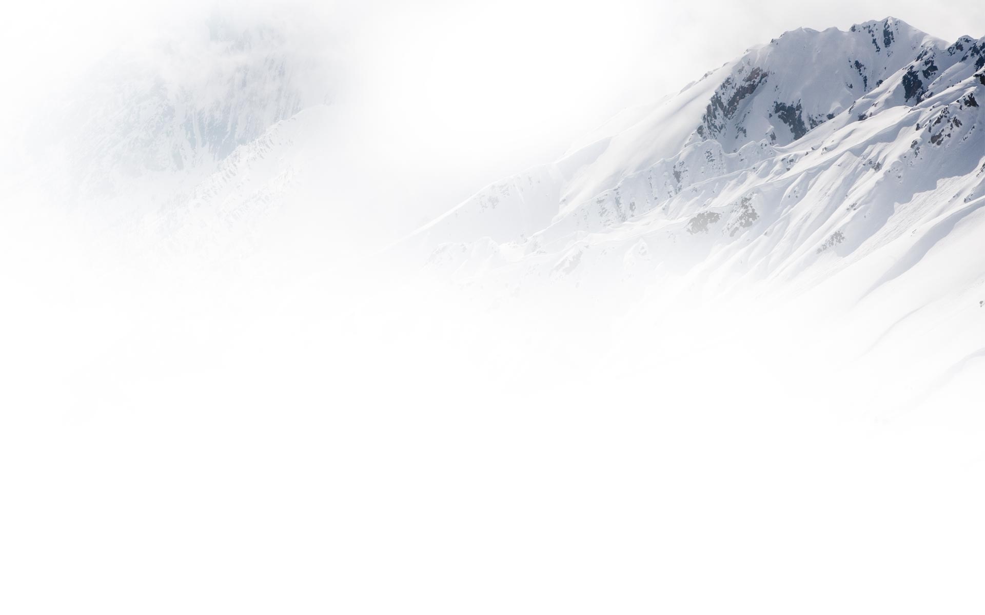Snowy mountains shrouded in mist HD Wallpaper