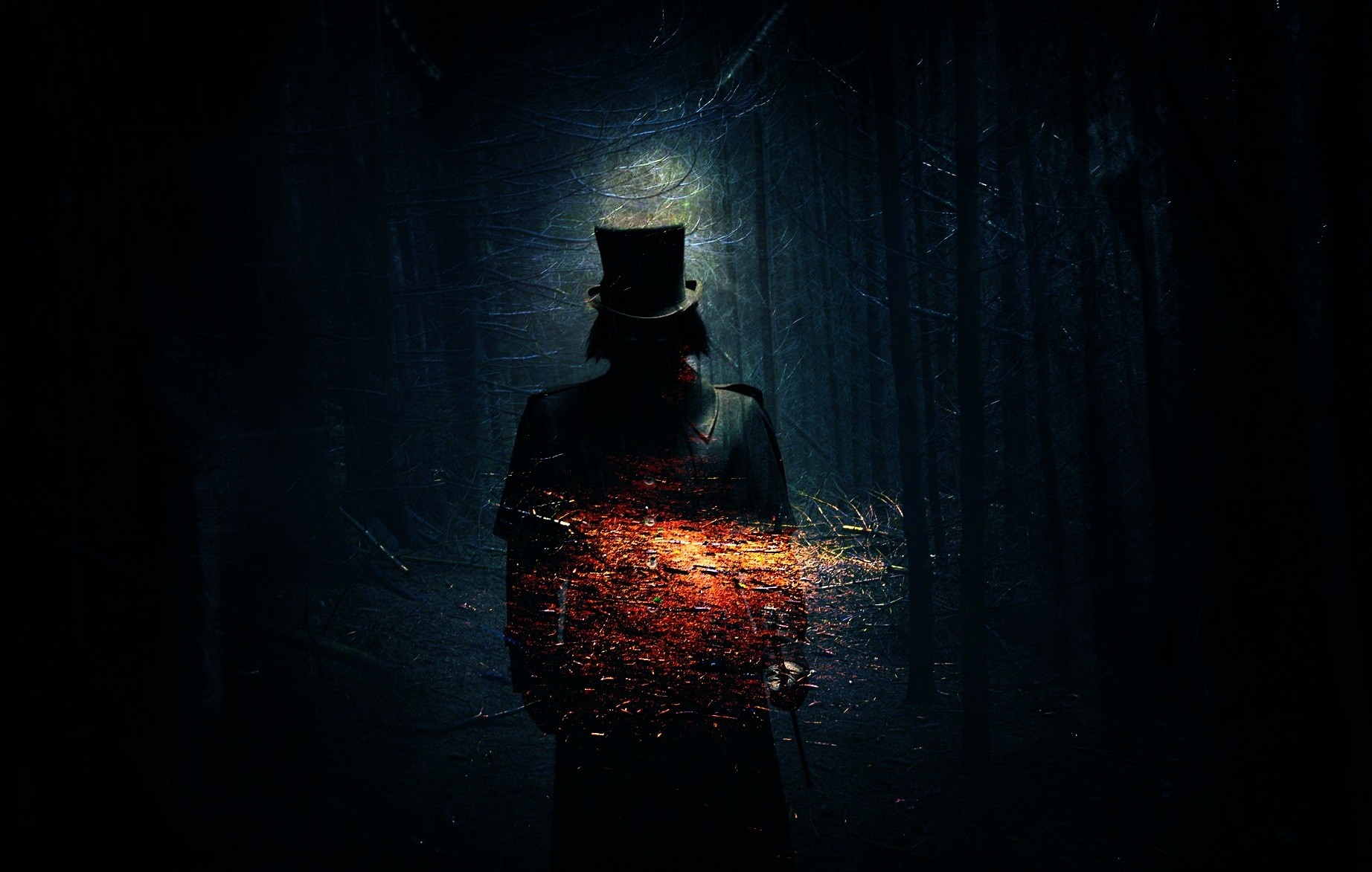 Man in top hat in dark forest with glowing effect HD Wallpaper