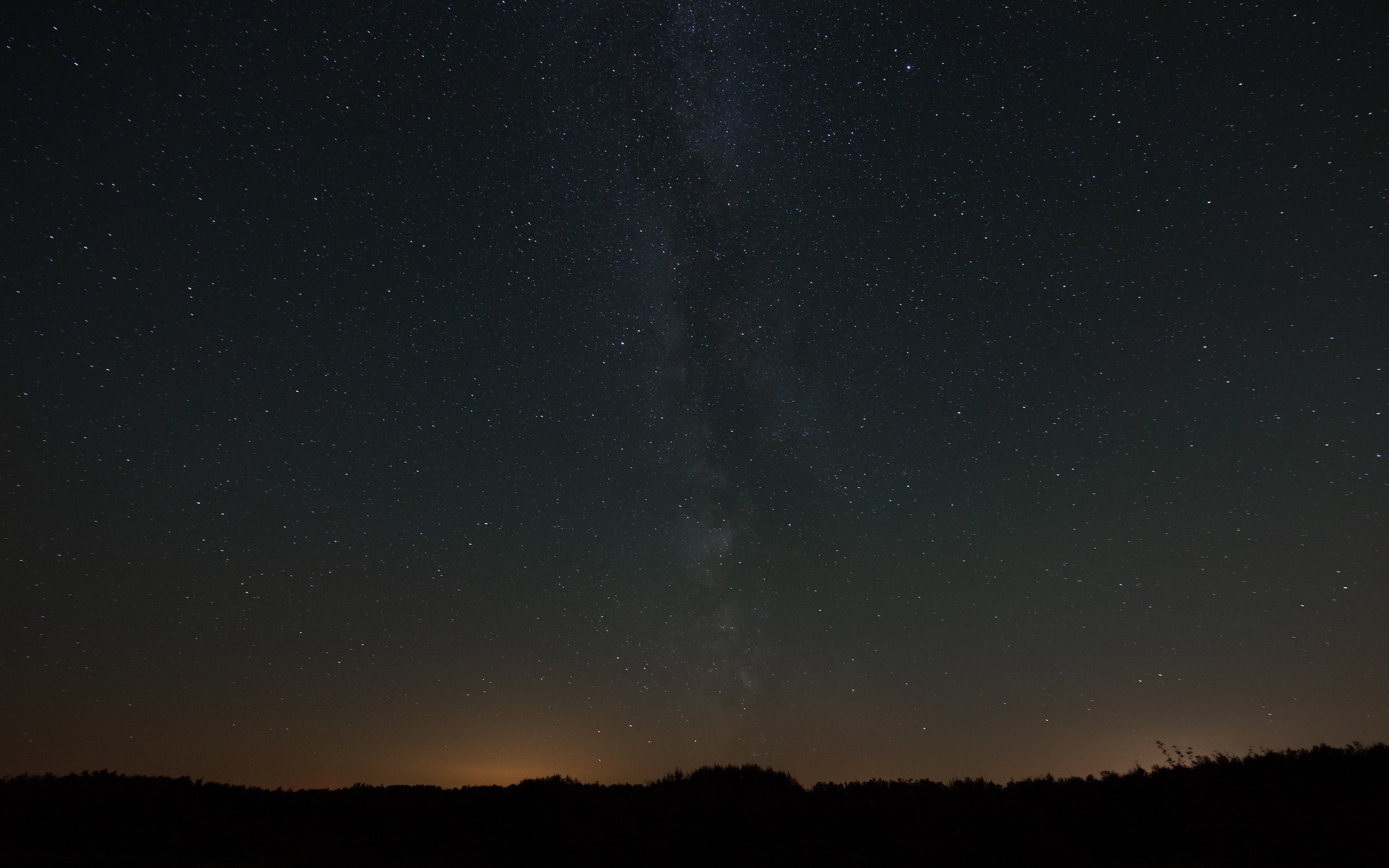 Night sky with Milky Way over silhouetted landscape HD Wallpaper