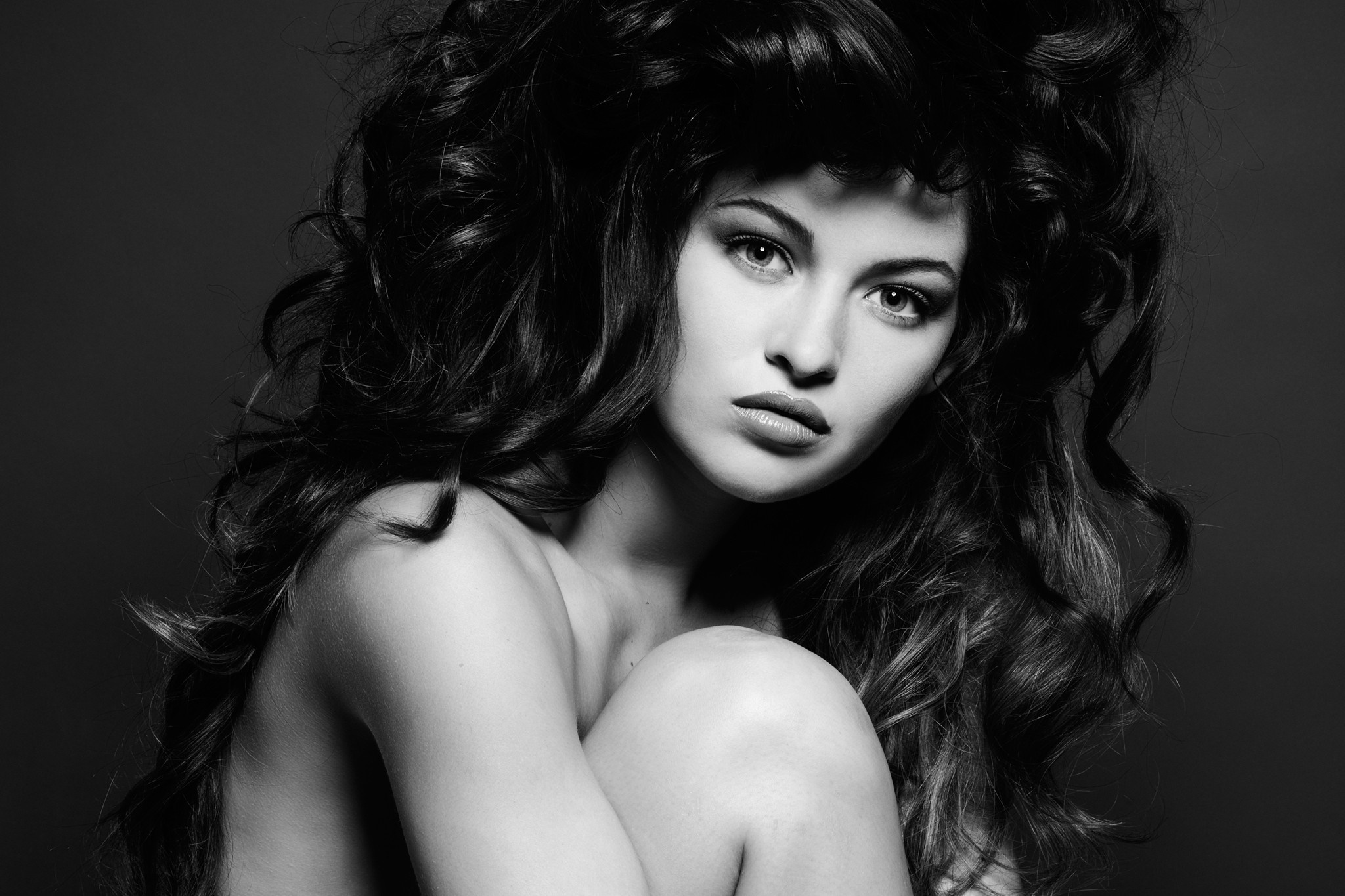 Monochrome portrait of a woman with long dark hair HD Wallpaper