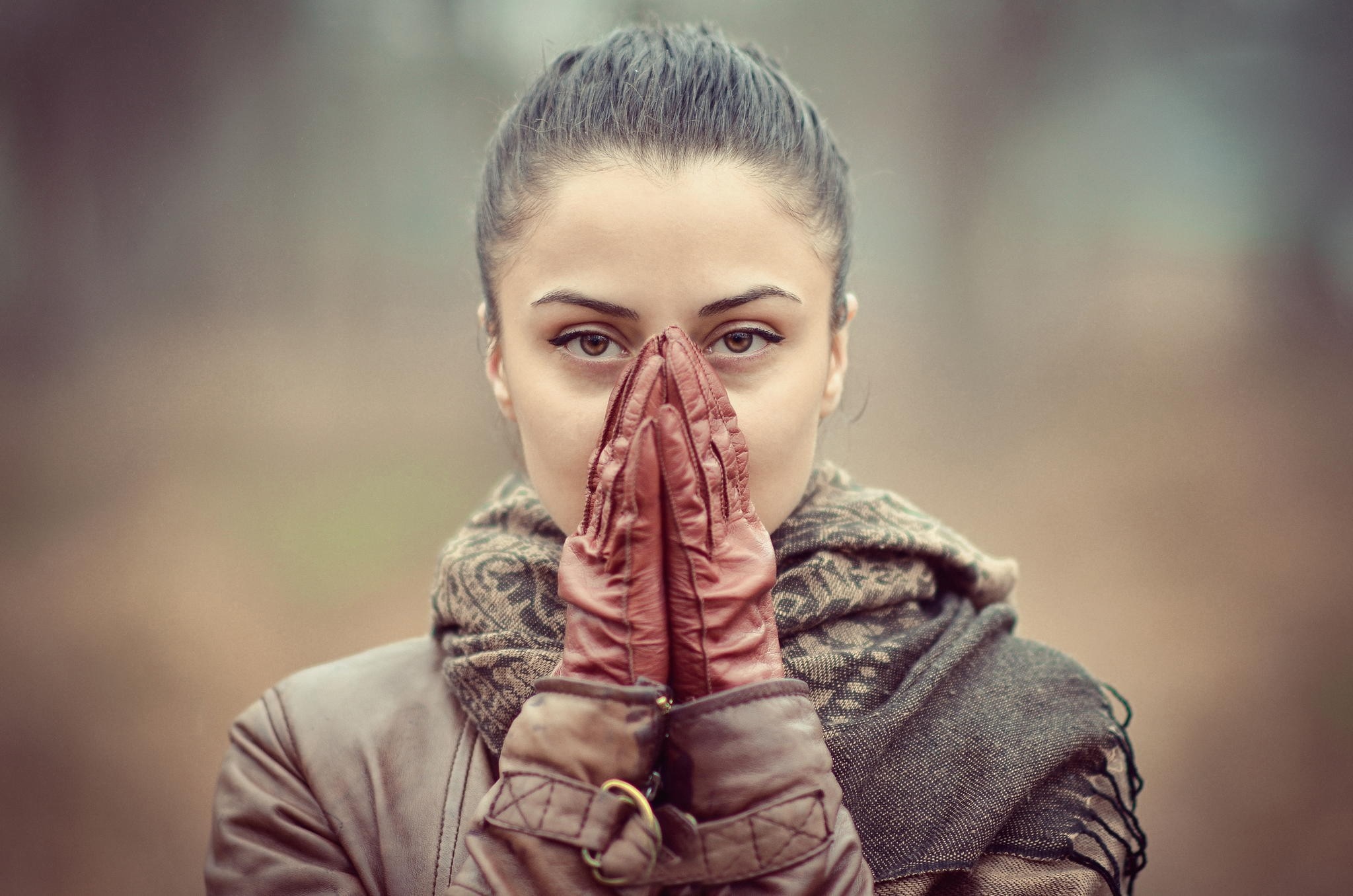 Woman wearing gloves and scarf, praying HD Wallpaper