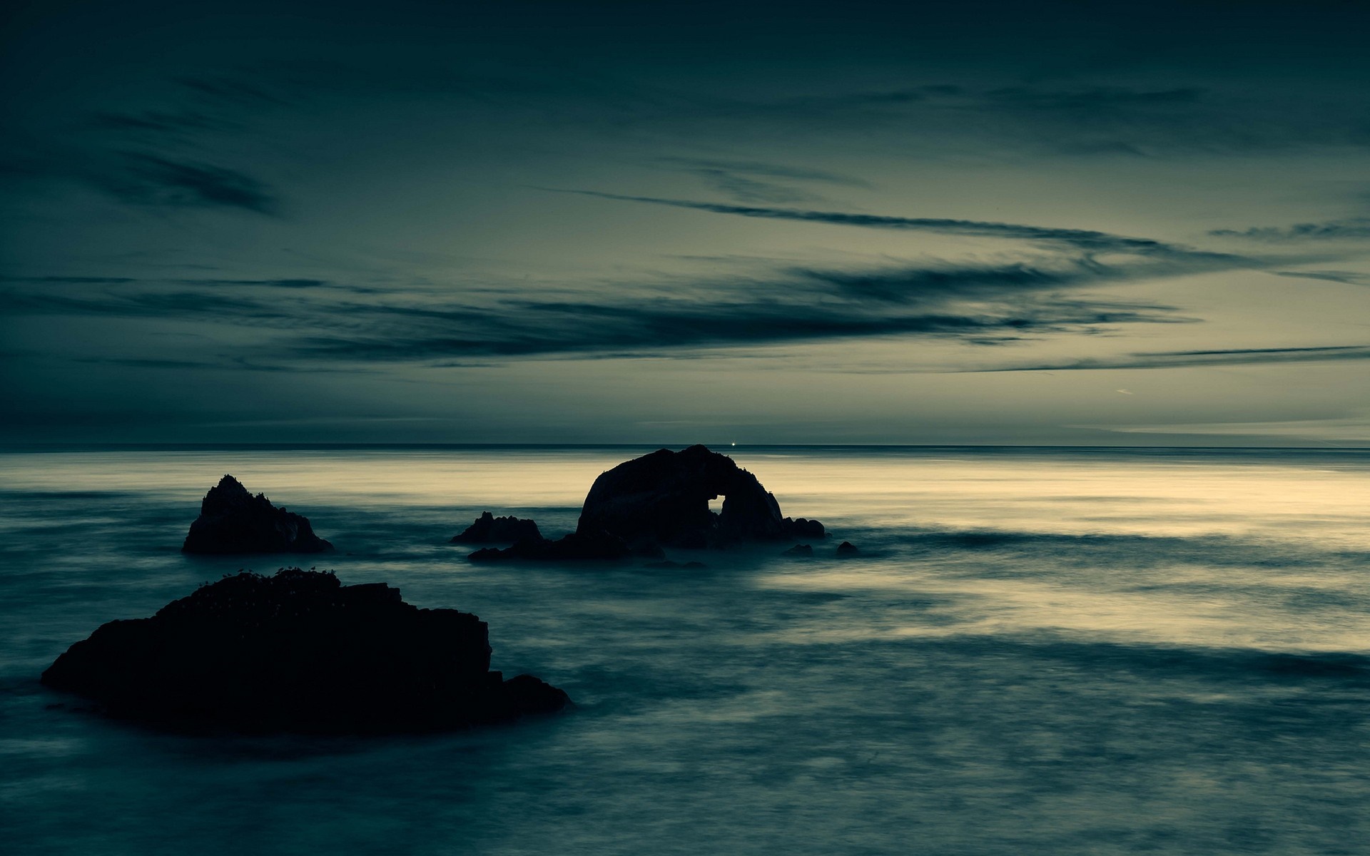 Sea rocks at dusk with archway HD Wallpaper