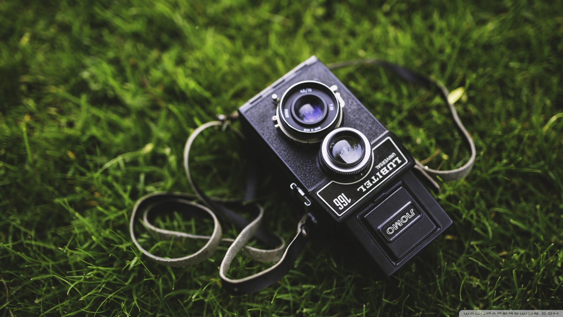 Lubitel 166 Universal vintage camera on grass HD Wallpaper
