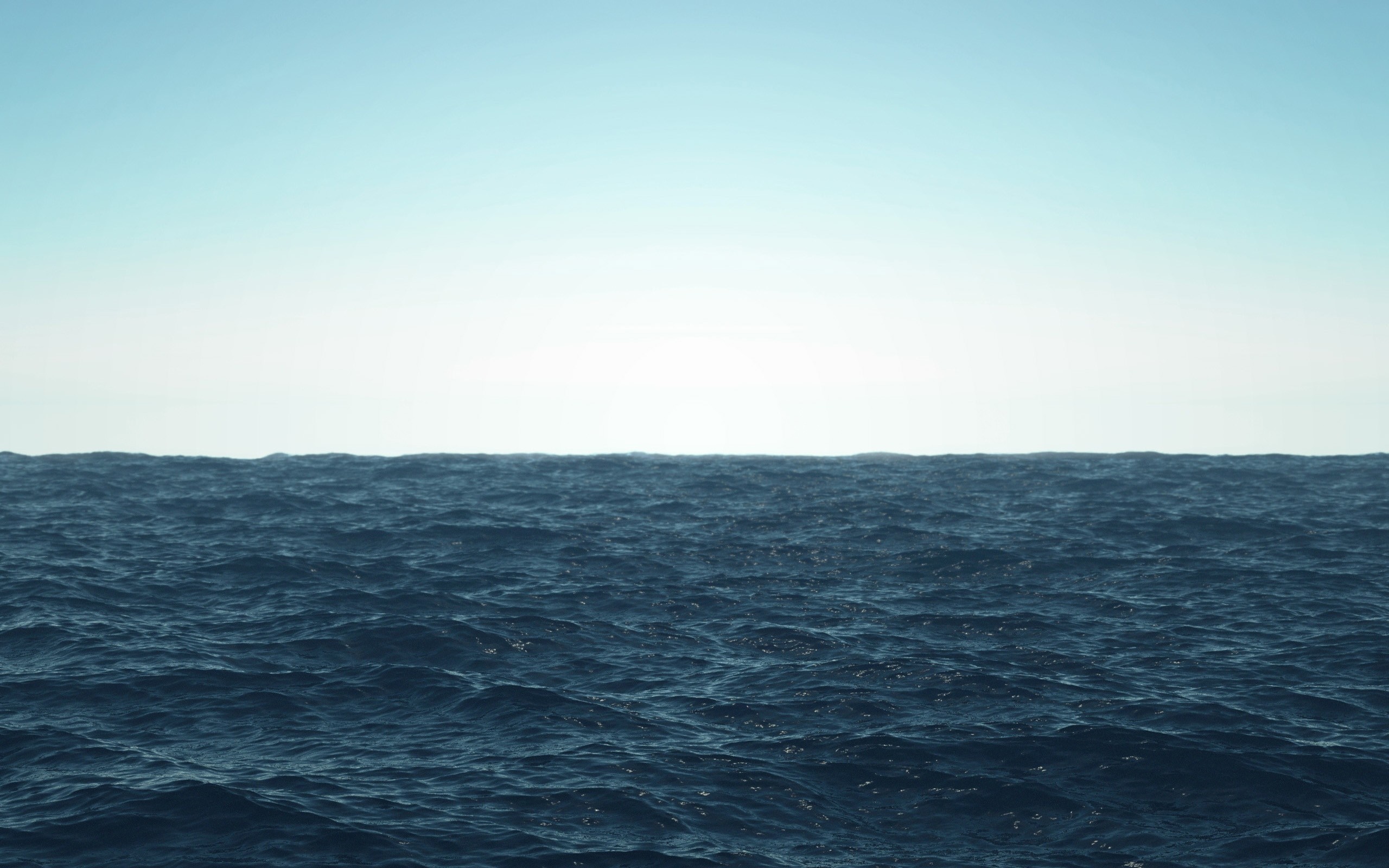 Ocean horizon with waves under a clear sky HD Wallpaper