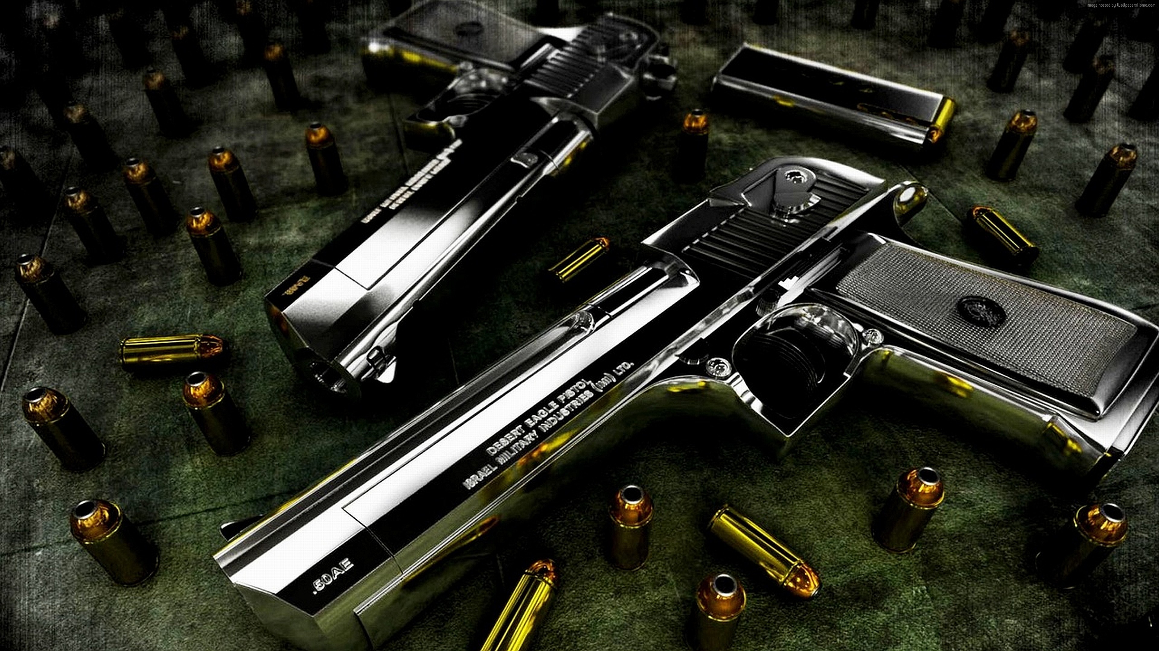 Two Desert Eagle pistols with bullets HD Wallpaper