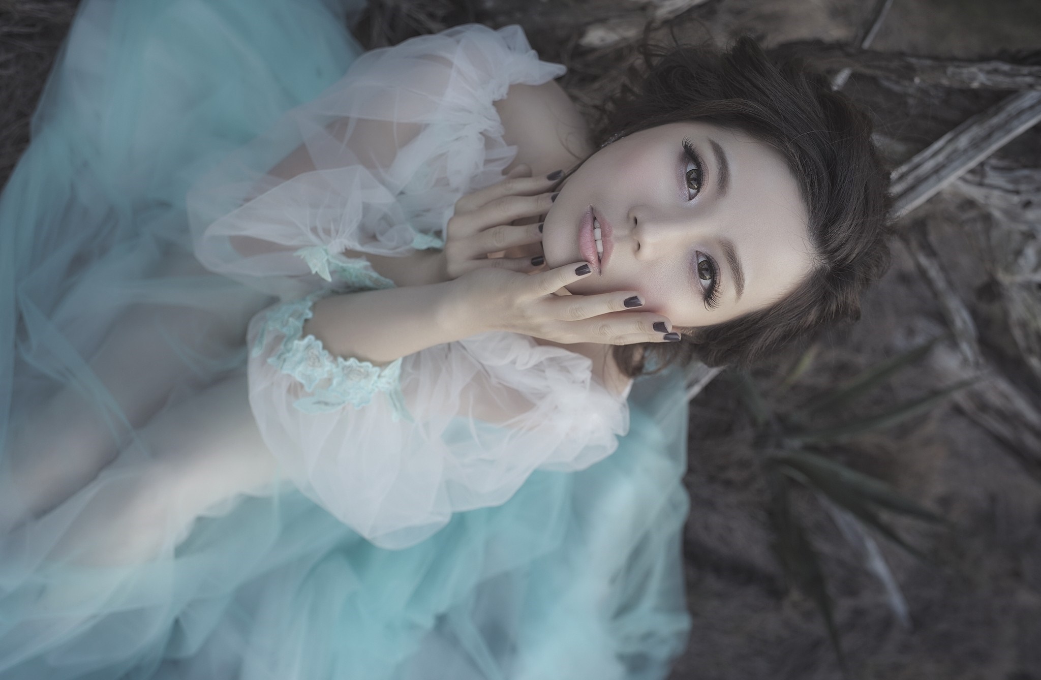 Asian woman in a light blue dress lying down HD Wallpaper