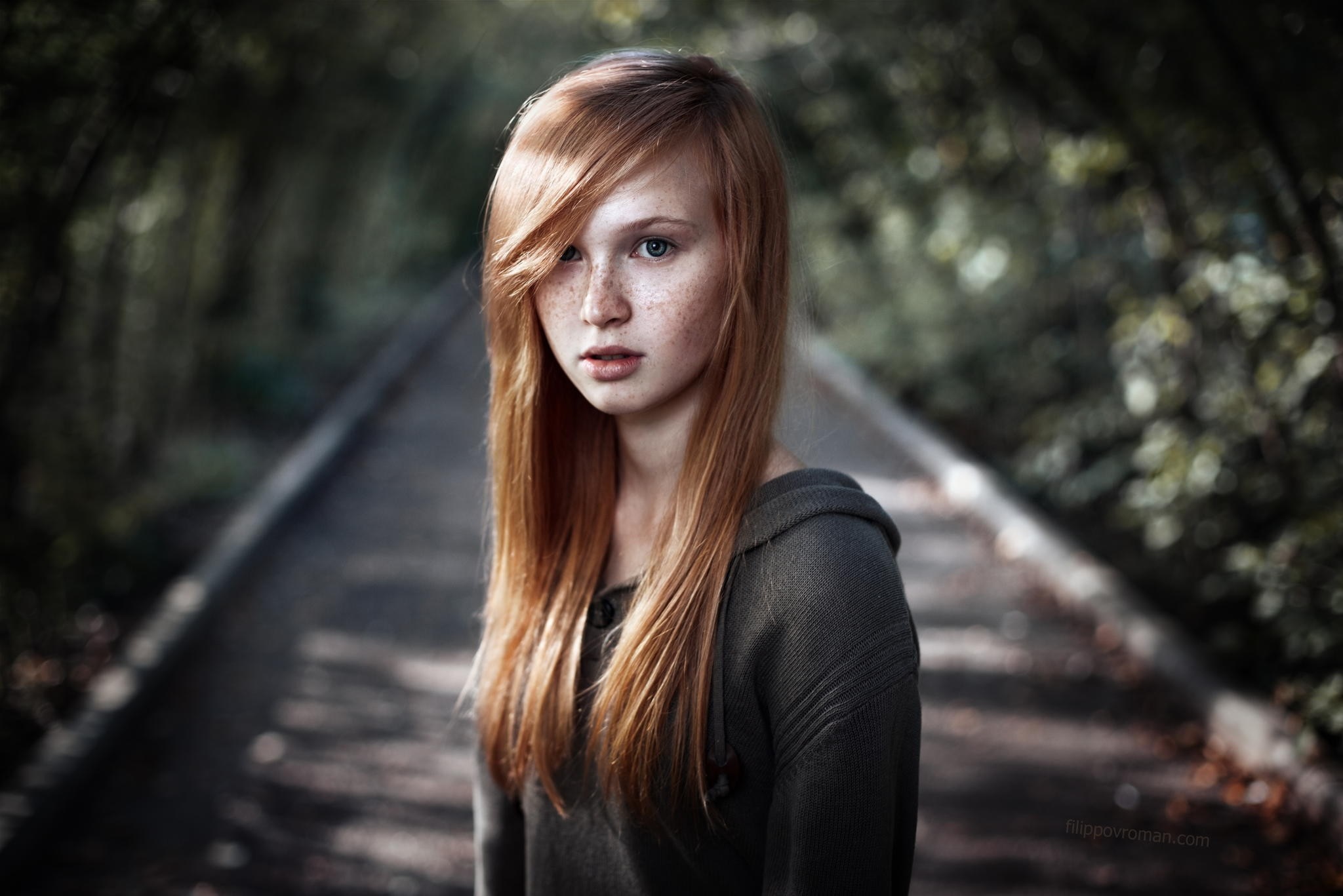 Young woman with long red hair and freckles HD Wallpaper