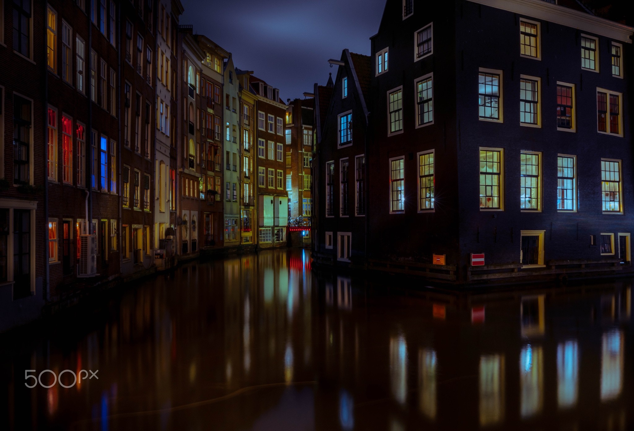 Amsterdam canal at night with reflections HD Wallpaper