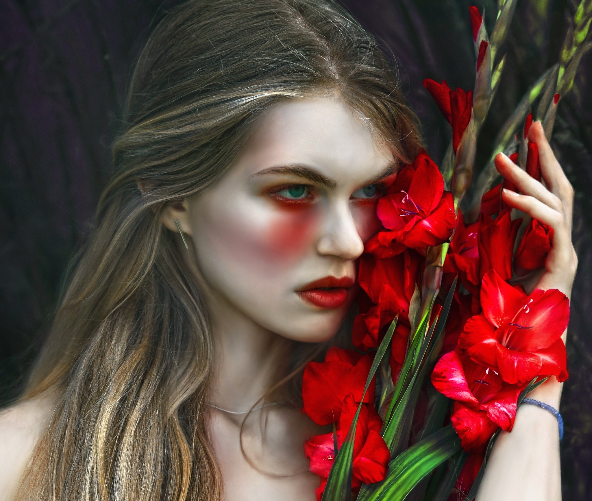 Woman with red gladiolus flowers HD Wallpaper