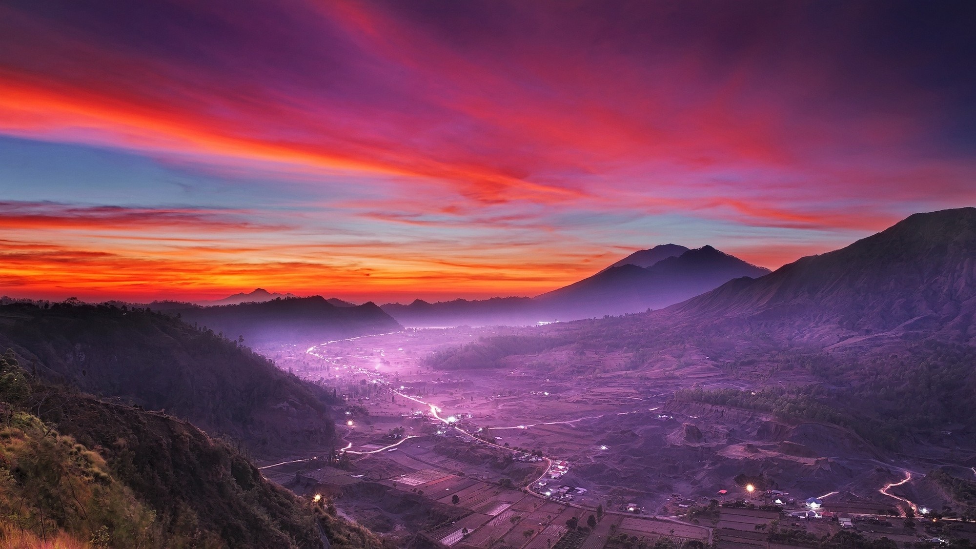 Valley and mountains at sunset with colorful sky HD Wallpaper