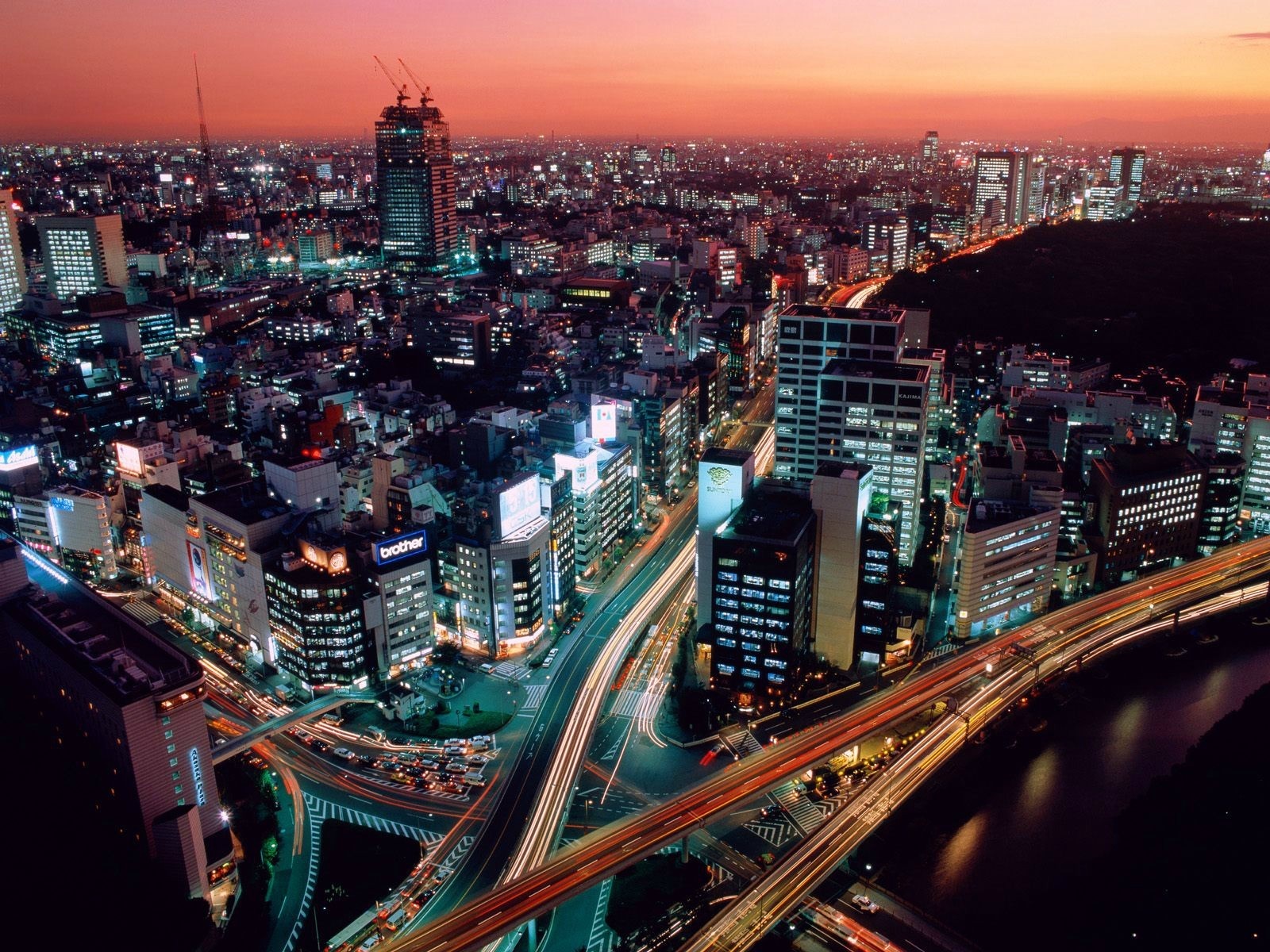 Cityscape at Dusk with Light Trails HD Wallpaper