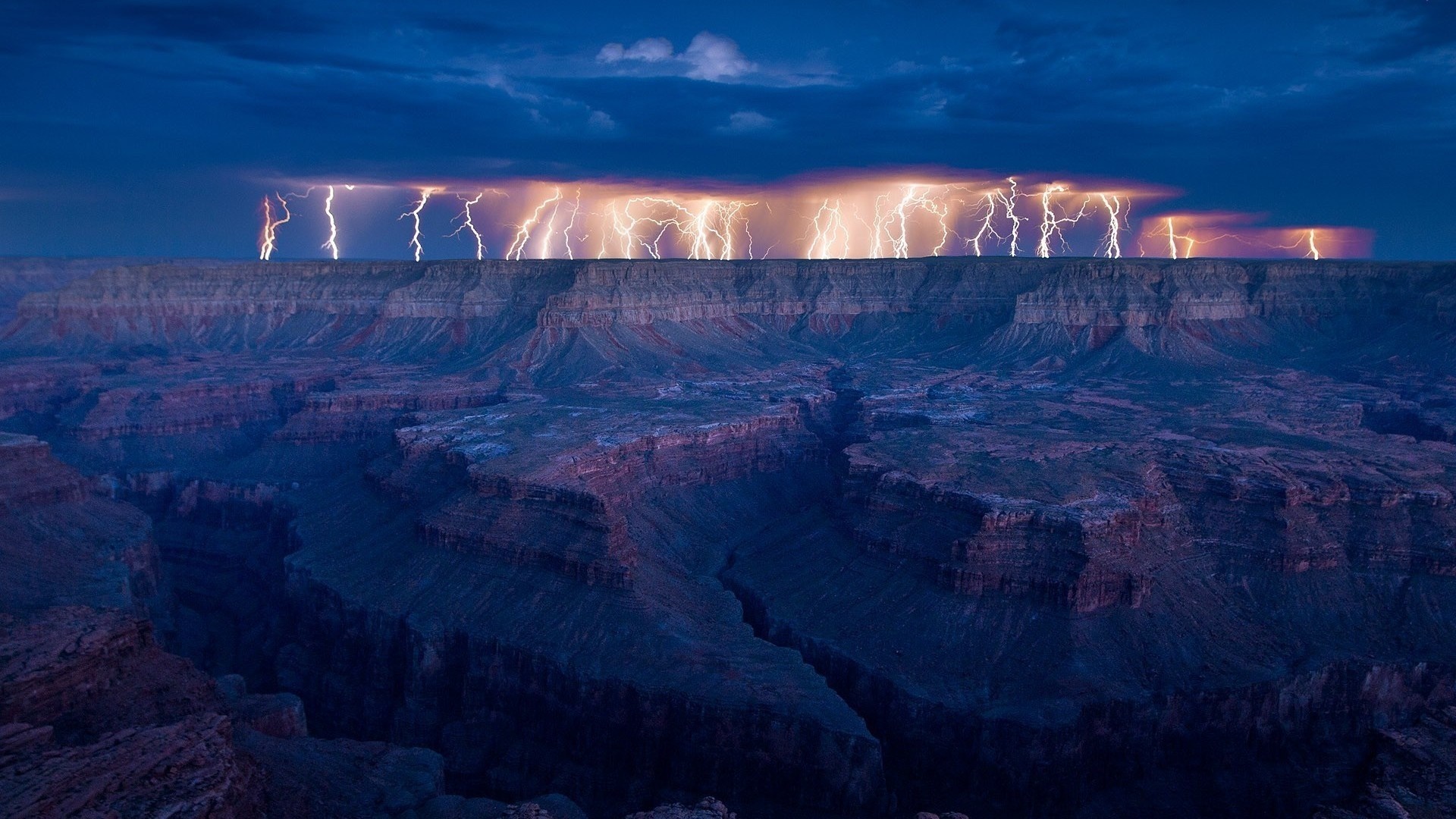 Lightning storm over the Grand Canyon at dusk HD Wallpaper