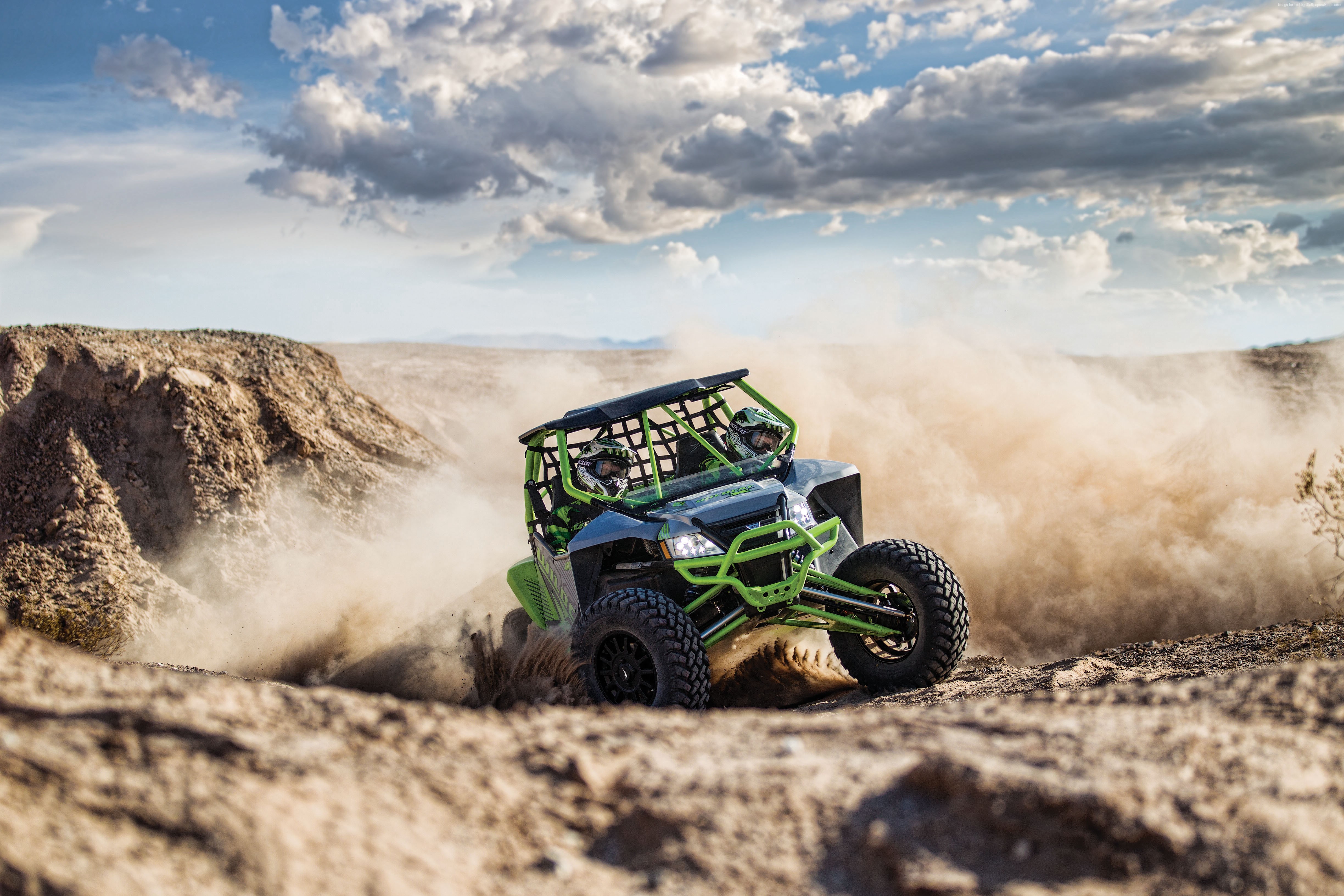 Arctic Cat Wildcat X UTV driving through desert dust HD Wallpaper