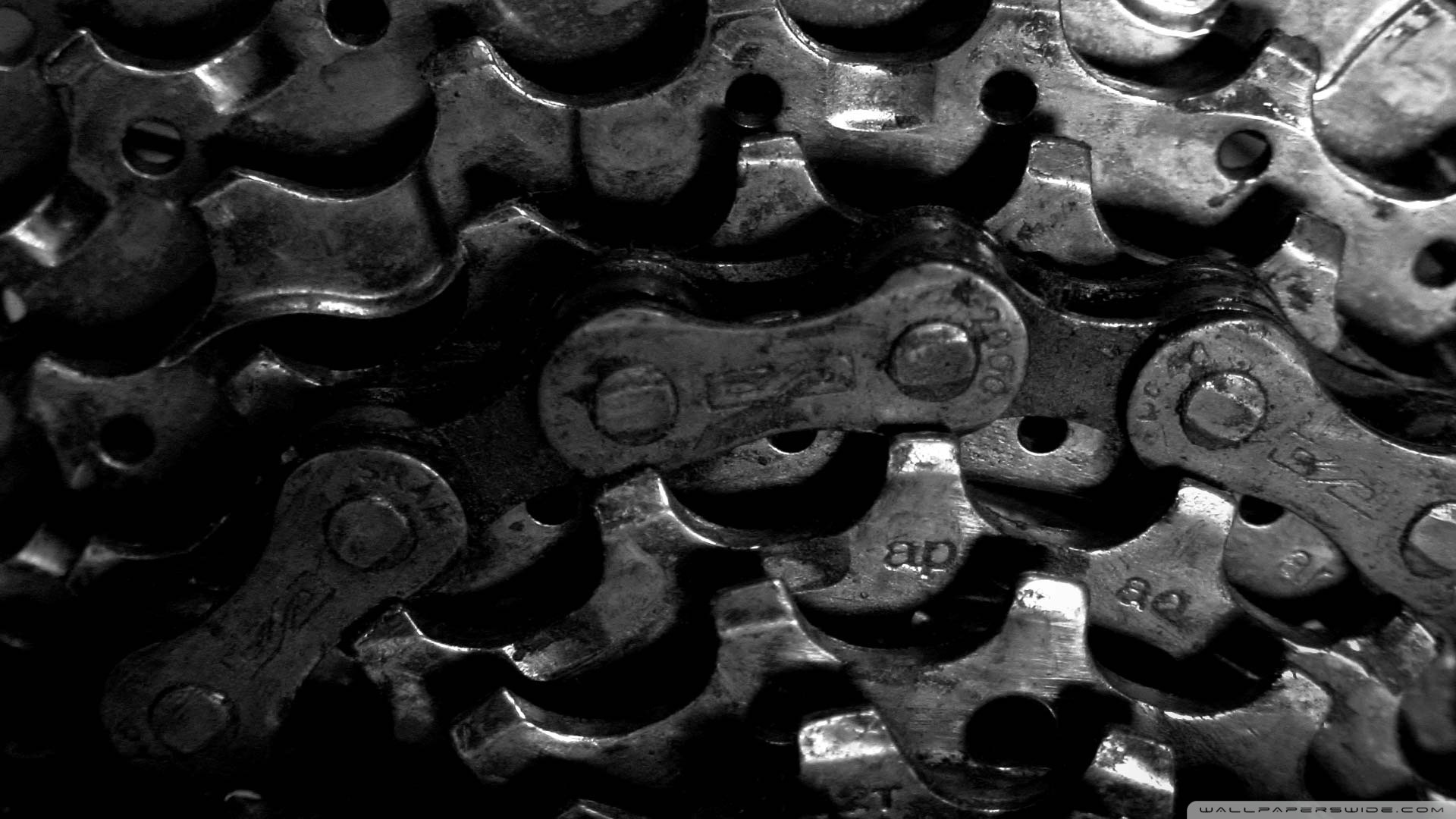Close-up of a dirty bicycle chain and gears HD Wallpaper