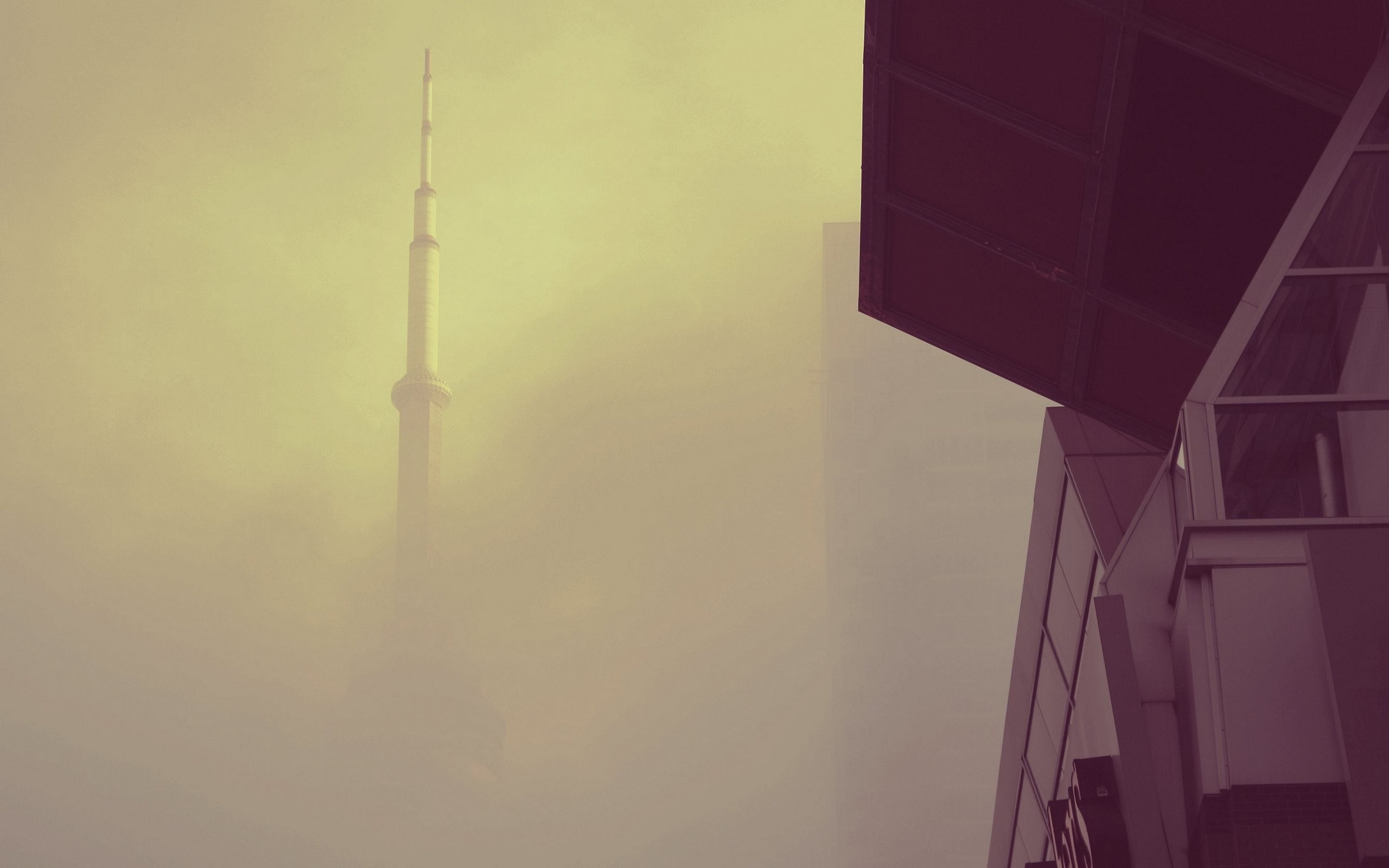 Tower in fog with modern building architecture HD Wallpaper