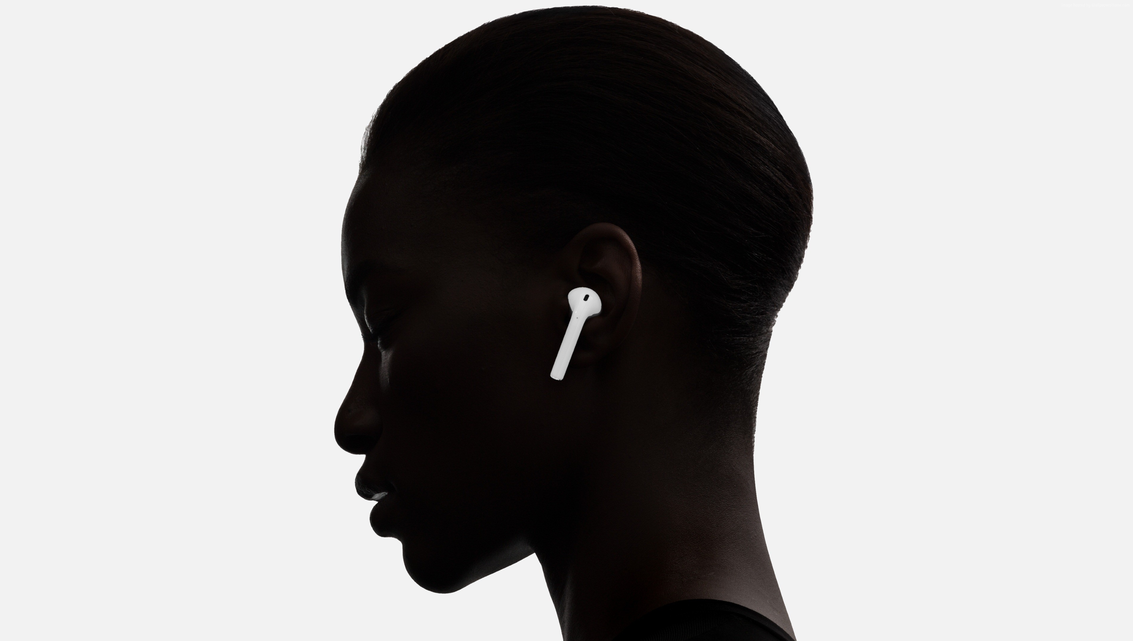 Woman wearing white AirPods HD Wallpaper