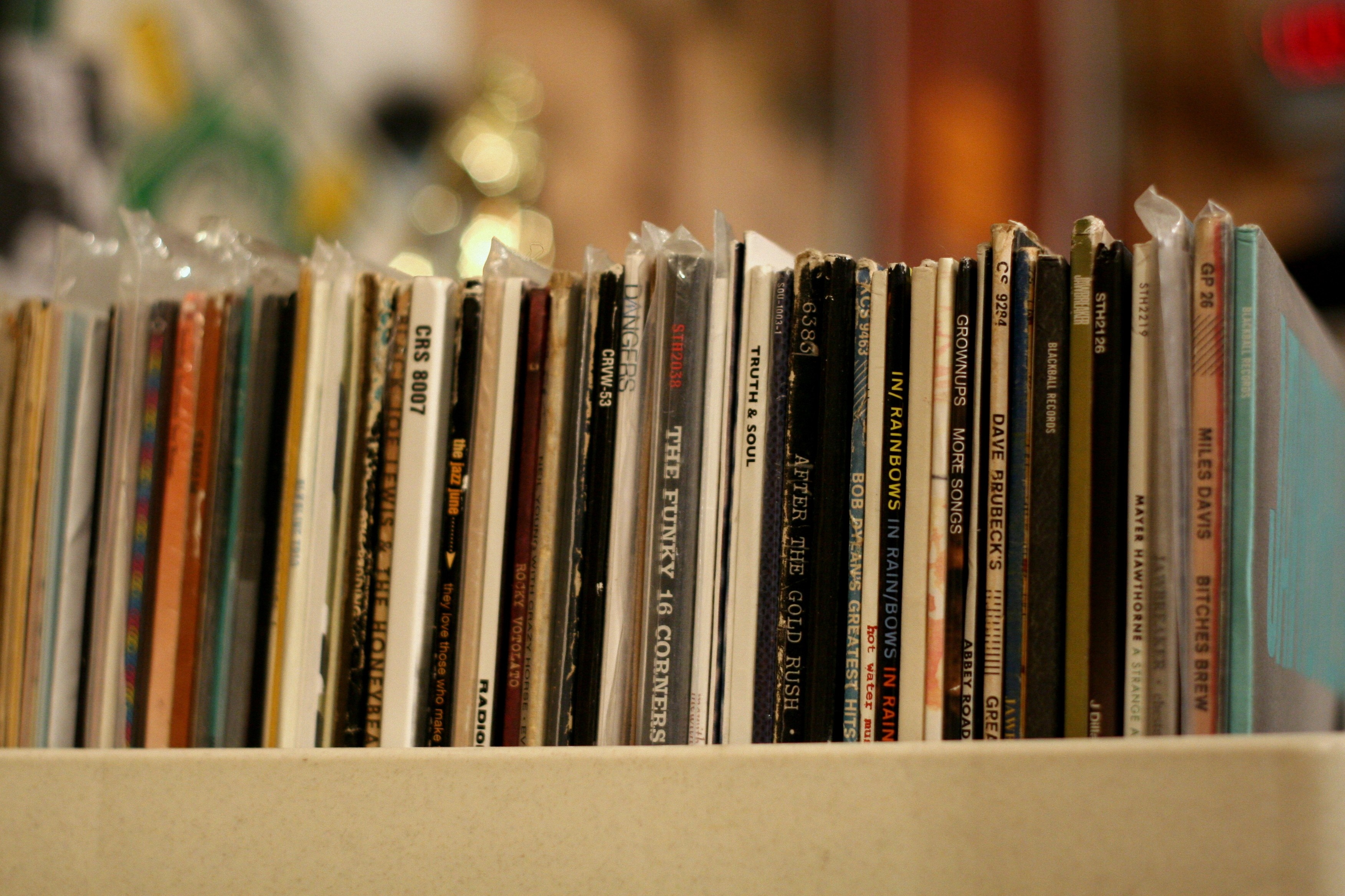 Record album covers on a shelf HD Wallpaper
