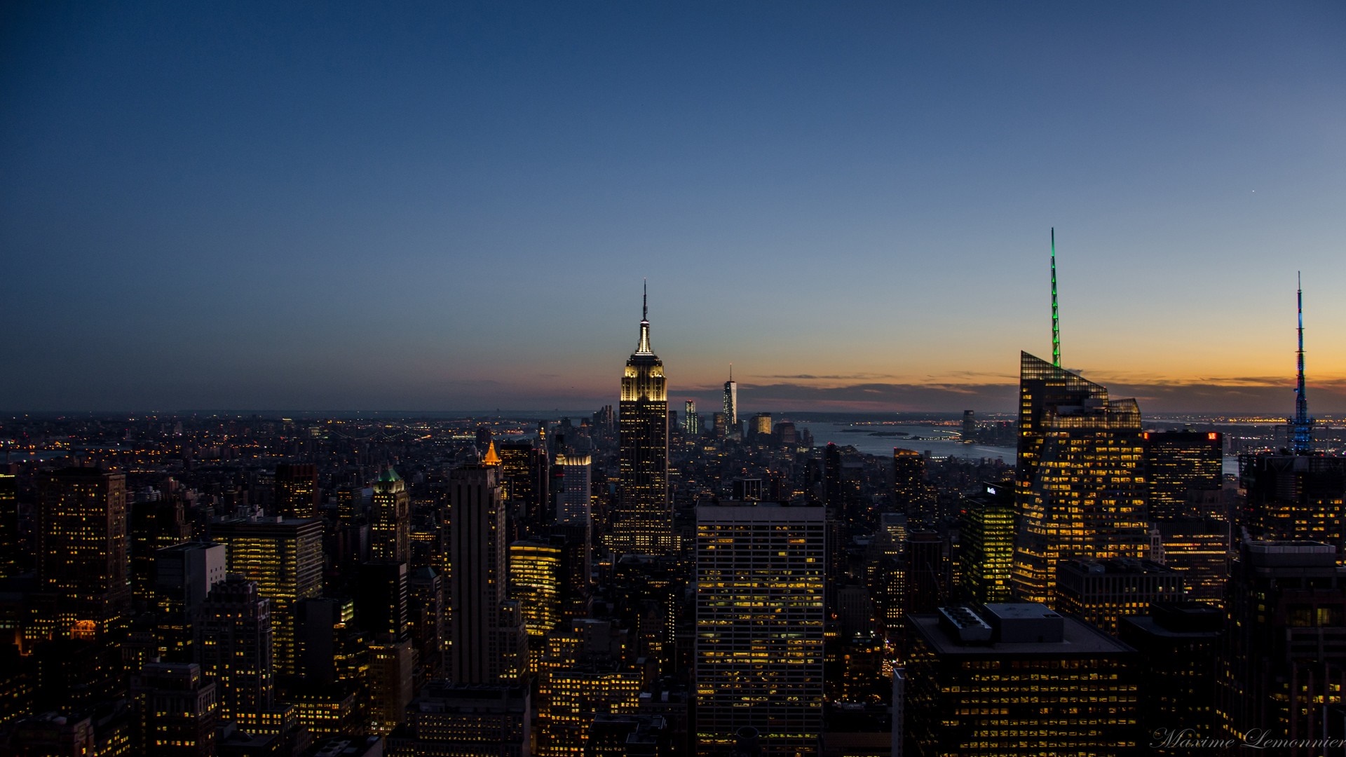 New York City skyline at dusk with Empire State Building HD Wallpaper