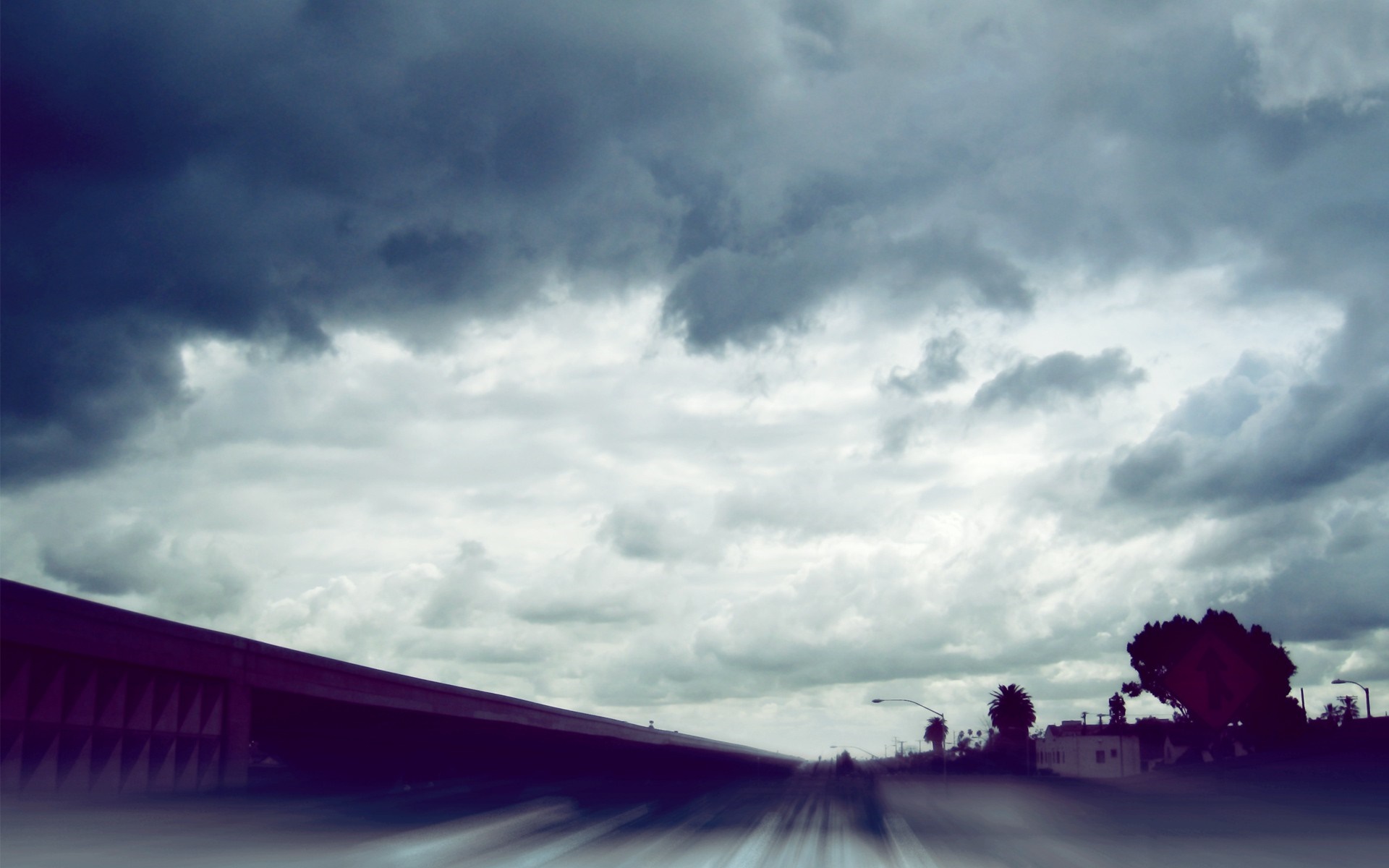 Stormy sky over a highway overpass HD Wallpaper