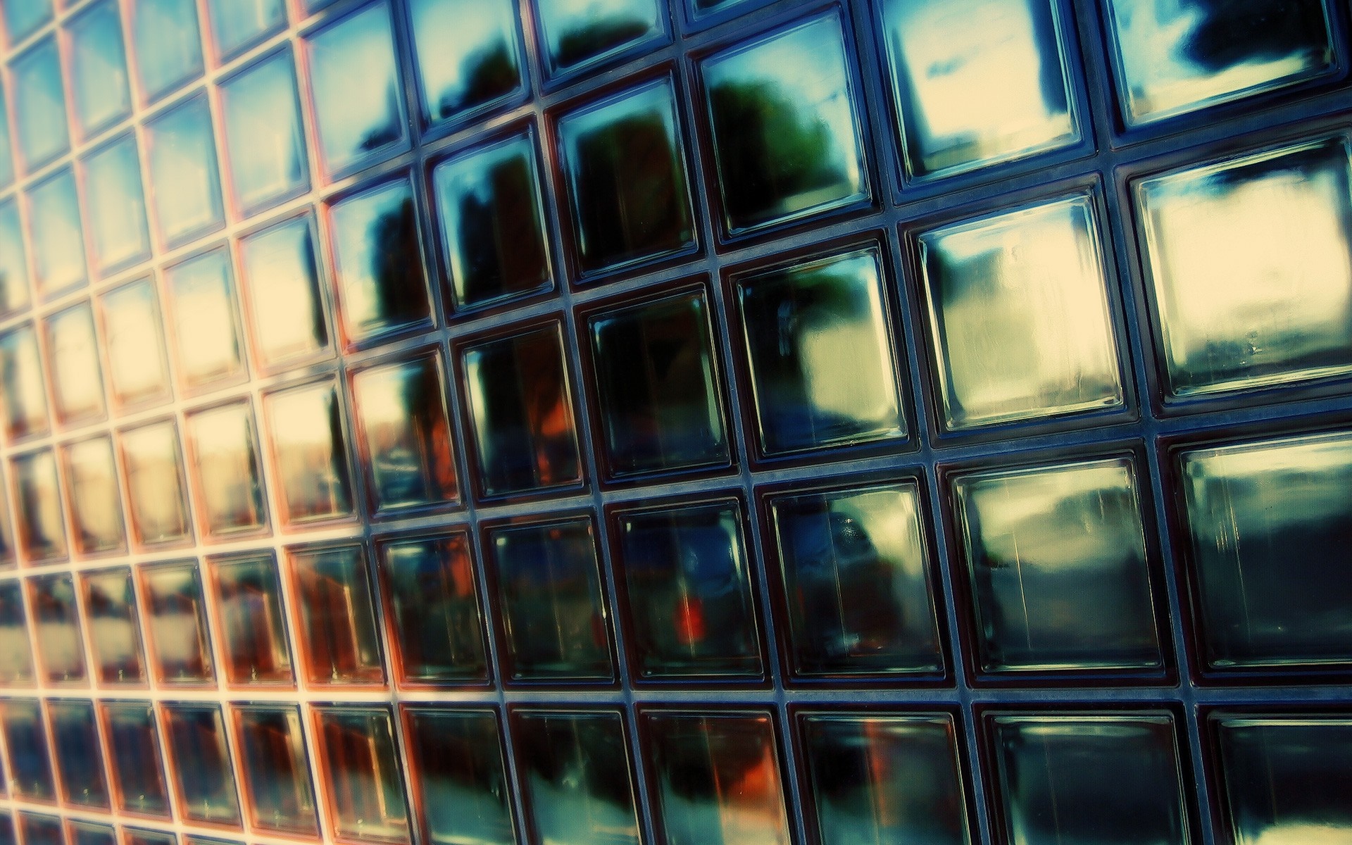 Glass blocks with reflections of trees and sky HD Wallpaper