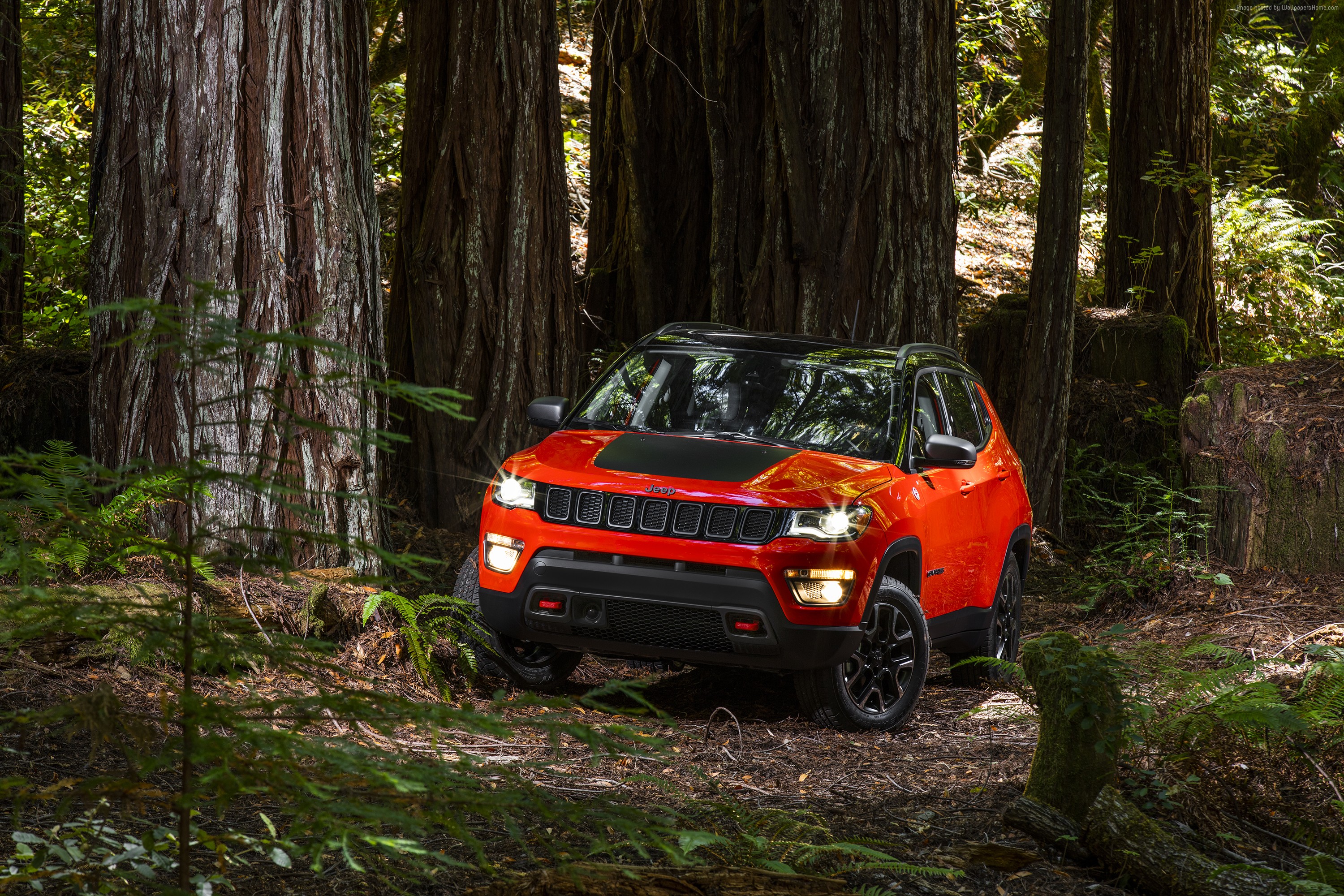 Orange Jeep Compass Trailhawk SUV in a Forest HD Wallpaper