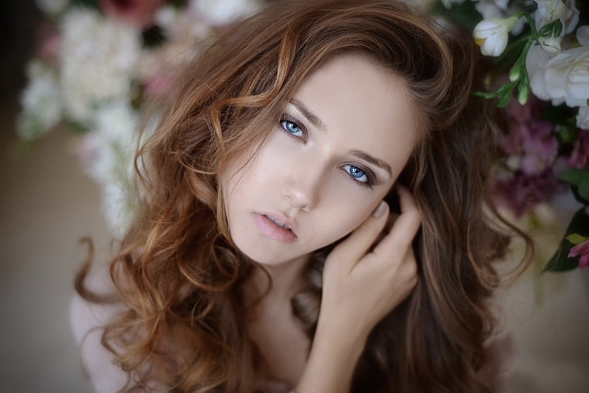 Woman with long brown hair and blue eyes HD Wallpaper