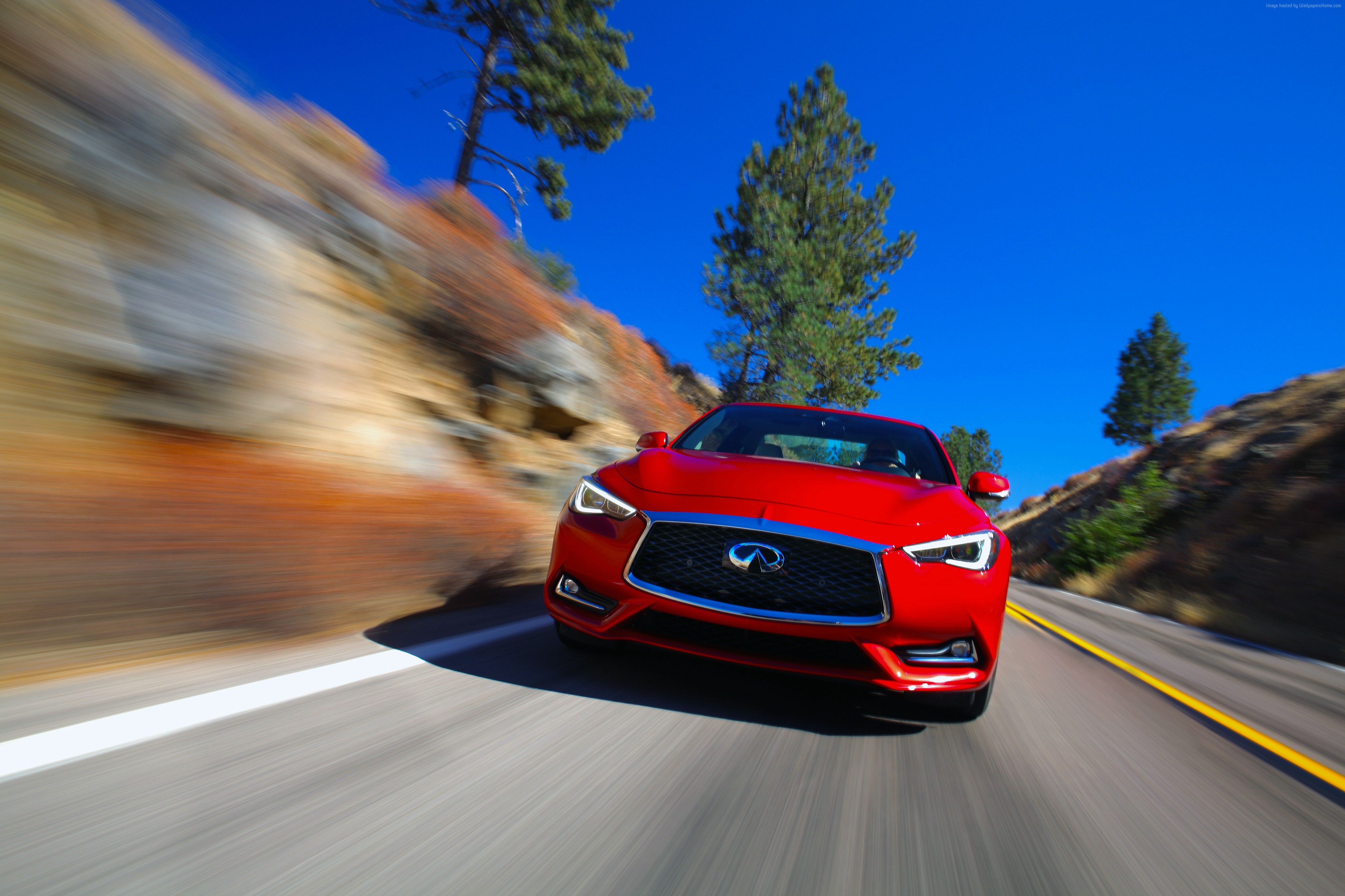 Red Infiniti Q60 Red Sport 400 driving on a road HD Wallpaper