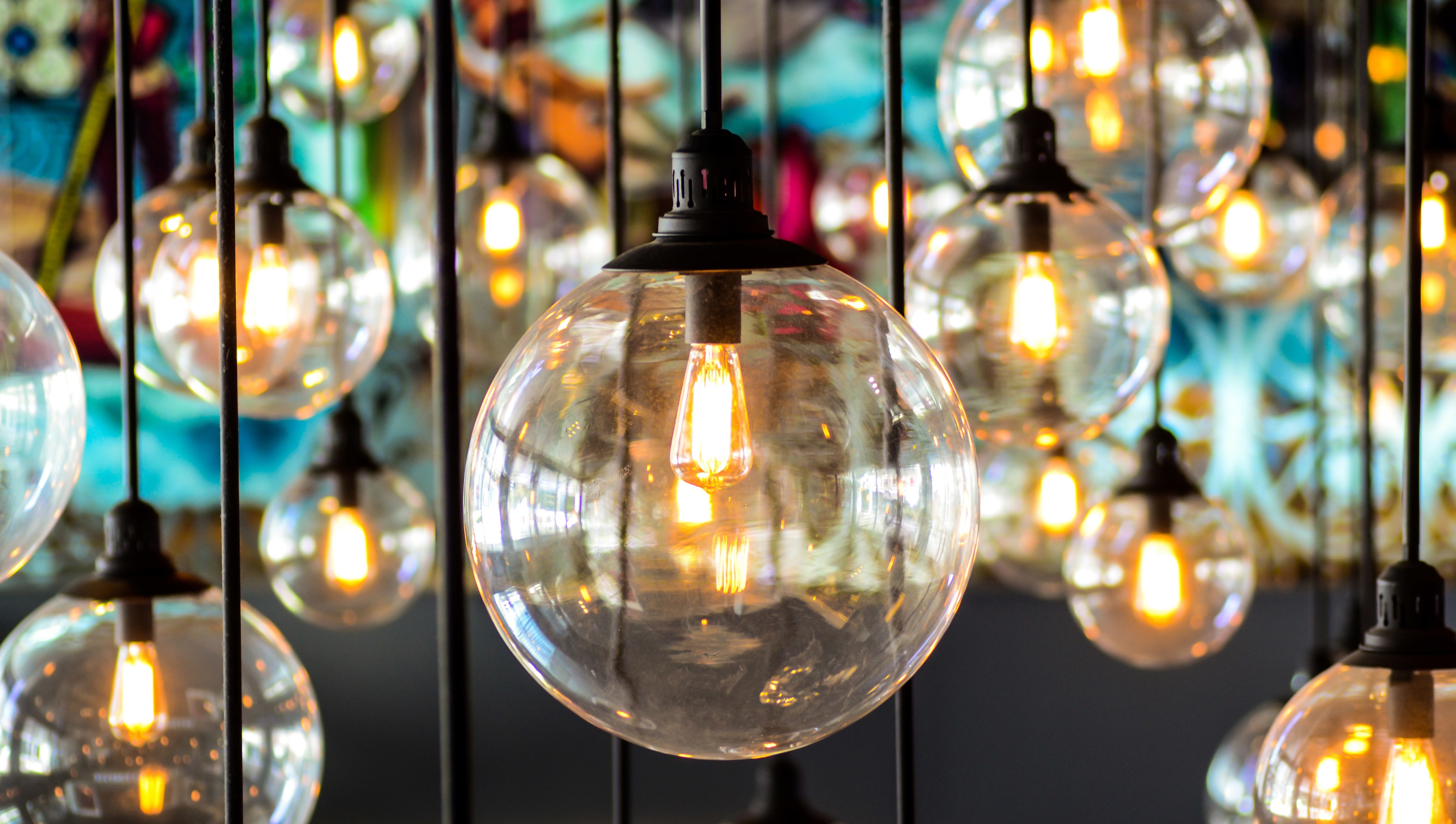 Glass globe light bulbs hanging from ceiling HD Wallpaper